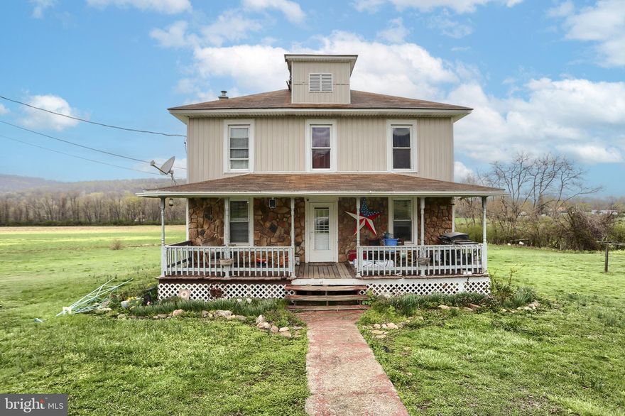 Country Charmer. Traditional style farmhouse on 1.44 acres.  Main floor laundry and bath combo. Updated Kitchen and hardwood floors throughout.
