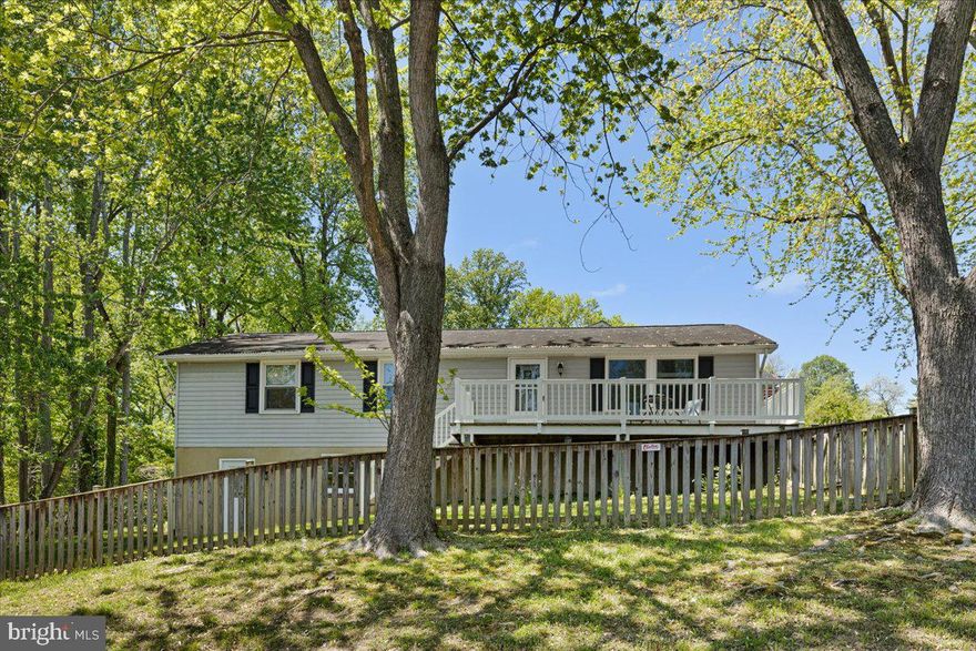 This home is a breath of fresh air! Recently remodeled, you will enjoy the open kitchen plan that adjoins the great room.. There is a wonderful side deck  looking out to your very large fenced back yard. This yard is just what you are looking for for your children, grand  children and pets! The primary suite has it's own private bath and the other two bedrooms share a lovely hall bath.  But wait, there is more! The entire lower level is finished!  A huge space for a recreation room, business in  your home, theater room or what ever you want!  This level features a walk out door to the fenced yard.  Another great feature  is that it is on a corner lot and there is lots of extra parking  along the side yard  in addition to parking right by the entrance.  This home is an unexpected find in the North Beach area and is suitable for so many different lifestyles. Just a few blocks to the North Beach boardwalk, restaurants, shopping  and so much more!