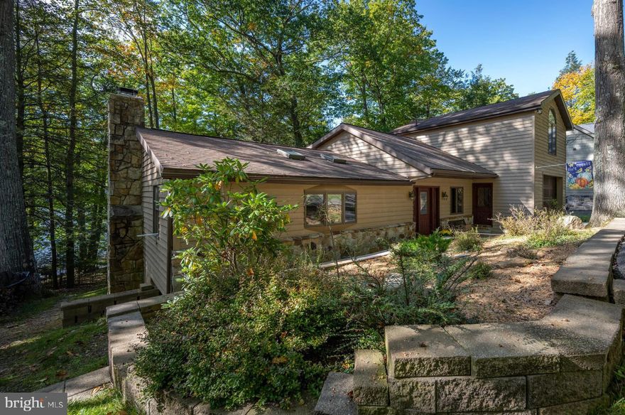 The best lakefront value on the market!  Offering beautiful sunset views from your level and naturally sandy shoreline, this newly updated 3/4 BR 4 .5 Bath lakefront cottage is move in ready.    The natural low maintenance setting means less maintenance and more time to enjoy the abundant recreational opportunities that Deep Creek Lake and Garrett County have to offer.  
 
2024 Updates and upgrades include:  New shingles, two added bathrooms, upgraded kitchen with lake views and direct access to the deck,  hybrid den/ bedroom added with adjacent full bath.  All bedrooms now have direct access to a private bath. 

Additional features include a 1 car garage,  paved driveway with plenty of parking, connected to public sewage, and plenty of room for outside activities.  

Located within close proximity to area restaurants, shopping, state parks, and the lake recreation center, you'll have easy access to just about everything.