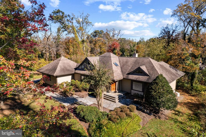 Premier Water-Oriented Living in Annapolis - Own a distinctive contemporary Acorn Home in Bancroft, neighboring Winchester on the Severn—an exclusive enclave with only 9 custom-built waterfront and water-oriented homes, each with its own deep water boat slip. Situated on a private 1.8-acre lot with a main level primary bedroom, this residence offers a serene lifestyle just 5 minutes from downtown Annapolis.

Vaulted ceilings with exposed wood beams and expansive glass create a bright, spacious feel, highlighting the open floor plan and entertaining deck. Enjoy complete privacy in the rear yard with tree-lined views. The main level offers a primary suite with generous sitting area and spacious bathroom.  Upstairs, find two bedrooms, a full bath, and extra space for an office or craft room. The large walkout basement with glass doors is totally versatile.  Plus, a whole house generator offers peace of mind in any circumstance.

Located in the esteemed Blue-Ribbon Broadneck School district and a short distance from the vibrant pulse of downtown Annapolis and Severna Park. Enjoy the perks of a pool bond at Chase Creek swim club or explore the nearby 13-mile B&A Trail, connecting Baltimore and Annapolis. With easy access to major routes like Route 50, this residence conveniently connects you to Baltimore, BWI, Ft. Meade/NSA, and Washington, DC, making it more than just a home—it's your gateway to the best within a 30-mile radius. Premier location, style and a boat slip on the Severn!—this one has it all!