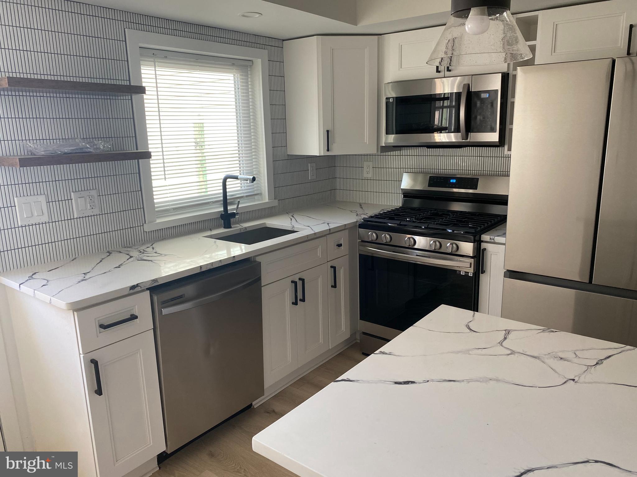 This beautifully rehabbed 2-bedroom, 1.5 bath townhouse is on a quiet street in Olde Richdont, with plenty of space for city living. Enter through the living room where you’ll find plenty of room to relax and unwind or entertain friends and family. The kitchen features new cabinets, stainless-steel appliances, and beautiful countertops. Right off of the kitchen is the large patio area, where you can enjoy the nice Spring and Summer days. On the second floor of the home, you’ll find one of the two spacious bedrooms with plenty of natural light and the full bathroom. The second bedroom is located on the third floor of the home and boasts 3 windows.
Conveniently located to local shopping and all the best local dining has to offer. Public transportation is easily accessible. Bus stops close by as is the trolley which east takes you to Target, Sacred Vice Brewing, and the Lunar Inn in Port Richmond. Headed west it takes you to Frankford & Girard for an evening out or to the Philadelphia Zoo. Within walking distance to the IGA shopping center, Riverwards Market, and Greensgrow Farms. Sip on some great coffee from nearby cafes or pick up some delicious treats from Stock’s Bakery. Schedule your showing of this great property today!
Tenant pays electricity, gas and water.