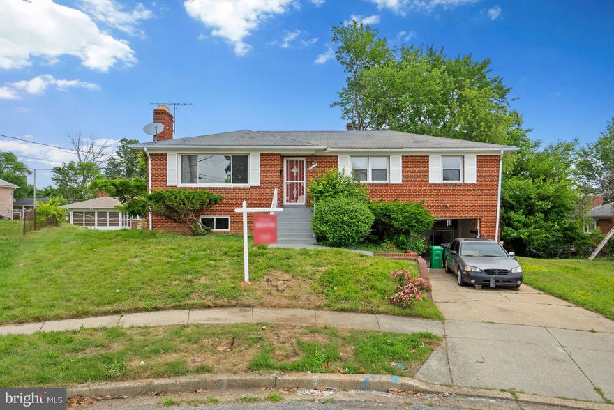 ***MAJOR REHAB NEEDED***
Located on a quiet cul-de-sac in Temple Hills, 2116 Gaither Street is a raised brick rambler offering three bedrooms, two full bathrooms, and a half bath across two levels. The main floor features a comfortable living room with a fireplace, a separate dining area, and a functional kitchen with interior access to the attached garage. Hardwood flooring and natural light enhance the home’s inviting feel.

All three bedrooms are located on the upper/main level along with two full bathrooms, creating a convenient and cohesive layout. The finished lower level includes a second fireplace, a half bath, and a spacious open area with walk-out access to the backyard—ideal for a recreation room, home office, or guest space.

Outdoors, the property includes a grassy yard, driveway parking, and room to garden or unwind. The neighborhood is experiencing new development, contributing to its long-term potential. Located close to the Branch Avenue Metro Station and the Capital Beltway, this home offers easy access to commuting routes. Major employers such as Joint Base Andrews are nearby, along with shopping and dining options at Marlow Heights Shopping Center and The Shops at Iverson. Local parks like Hillcrest Park and Oxon Run Parkway, as well as cultural destinations like the Smithsonian Anacostia Museum, provide additional ways to enjoy the area.