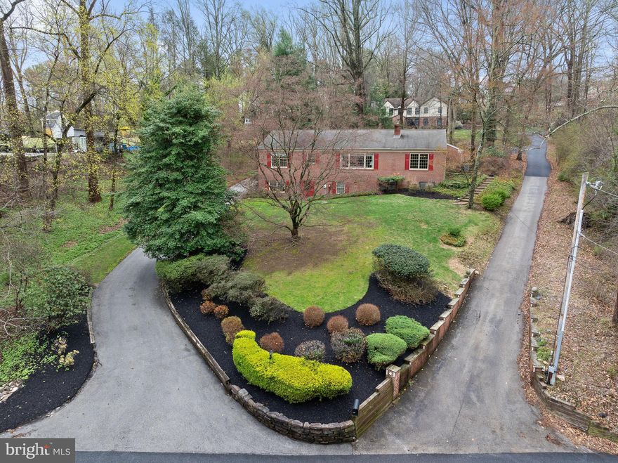 Enjoy picturesque and convenient one-story living in Media!
This charming brick ranch-style home boasts a wonderful flow, abundant natural light, and stunning bucolic views, offering the ideal one-level living experience.
Enter through the inviting covered front porch into a tiled entry hall that provides access to the entire main floor. Begin in the spacious eat-in kitchen, complete with granite countertops and exposed wood beams. The kitchen also offers convenient access to the two-car garage, laundry/powder room, and the brick patio for outdoor enjoyment.
The bright dining room features a chair rail and leads into the showstopping living room. This expansive space is enhanced by a gas fireplace, exposed brick, wood beams, 9-foot ceilings, and beautiful views, making it perfect for relaxing or entertaining.
The primary suite is a peaceful retreat with an updated bath and a walk-in closet with an organizer. Two additional well-sized bedrooms share a centrally located hall bath. The main level also features hardwood floors throughout and plentiful closet space.
From the main level, a flight of stairs leads down to the daylight-filled walkout lower level. This versatile space includes a large finished area with high ceilings, as well as additional storage and utility spaces. The lower level offers endless possibilities for customization to suit the next homeowner’s needs.
Outside, you'll find an attached two-car garage, a large parking area perfect for entertaining, a flagstone patio, a covered porch, and beautifully maintained landscaping.
Located just minutes from major highways, restaurants, and retail, this home seamlessly blends the tranquility of its peaceful setting with the convenience of an ultra-accessible location.