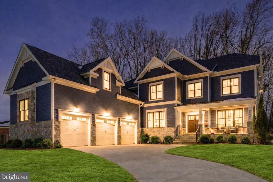 This exquisite custom home, built by Home Green, offers 7 bedrooms, 6 bathrooms, and 7,131 finished square feet across three levels. Located in the heart of Vienna on a premium 0.47 acre lot backing to trees, it blends privacy with an exceptional setting. Dramatic two story foyer and open concept main level showcasing top tier materials, designer finishes, wide plank hardwood floors, and statement ceilings throughout. Formal dining room and living room, perfect for entertaining. Breakfast room and Chef’s kitchen, anchored by an oversized island, striking Italian Carrara marble countertops, and a full Wolf appliance suite. Spacious family room with coffered ceilings, gas fireplace and wet bar with wine fridge and storage. The primary suite is truly one of a kind, featuring two spacious walk-in closets, one exceptionally large with an adjoining bonus room that can serve as a private gym, office, or personal retreat. It’s a versatile space you have to see to believe and unlike anything else on the market. Each additional bedroom offers generous space and en-suite bathrooms. The walk-up lower level is ideal for entertaining, with a game room, recreation room with a fireplace and wet bar, a media room, a full bath and two bedrooms, perfect for an au pair or in-law suite. Thoughtful upgrades, including smart switches and home automation throughout, bring modern convenience to every corner of the home. Additional highlights include a covered front porch, back patio, oversized three car garage with elevated ceilings (for future car lifts), multiple fireplaces, two laundry rooms, a mudroom and designer lighting throughout. Amazing Vienna location close to amenities and a commuters dream close to I66. Within the top rated Madison Pyramid. This isn’t just a home, it’s luxury, redefined.