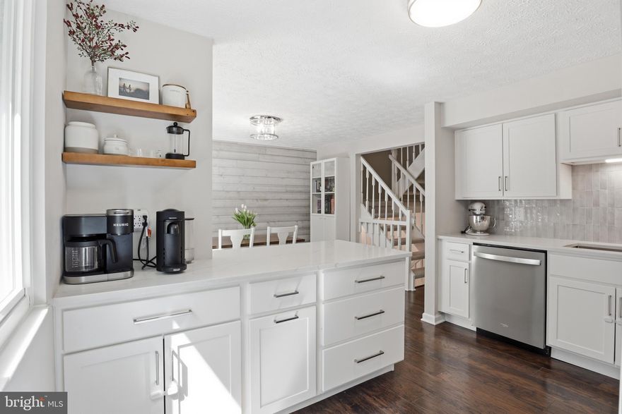 This Springfield townhome was recently updated and has been lovingly cared for.
The kitchen sets the tone: white shaker cabinets, granite counters, glass tile backsplash and stainless appliances. Luxury vinyl floors run through the main level, and the dining area opens to a deck with tree views.
Upstairs, a comfortable primary suite with walk-in closet and private bath, plus two additional bedrooms and a renovated full bath. All three bedrooms carpeted and cozy.
The walk-out lower level has a spacious rec room and half bath, with direct access to a fully fenced backyard and paver patio.
Minutes to NGA, Fort Belvoir, Fairfax County Parkway and I-95. Springfield Metro 10 minutes away.