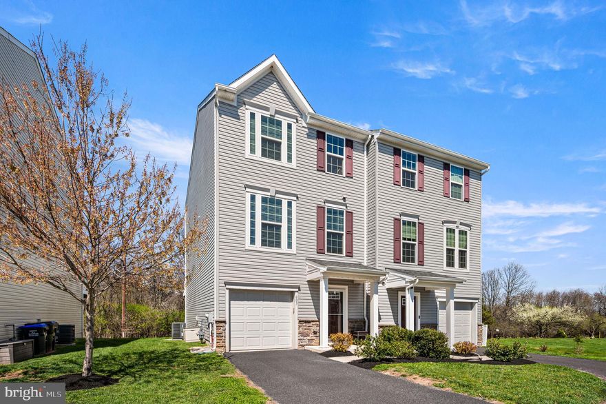 Come home and step into effortless living in this beautifully maintained 3-bedroom, 2.5-bath twin home, built in 2017 and tucked within the highly sought-after Owen J. Roberts School District. With over 2,200 square feet of thoughtfully designed space, this home blends modern comfort, style, and convenience in all the right ways. 

Situated on one of the best lots in the community, this corner property backs to natural landscape, providing both privacy and a peaceful setting. 

As you enter, you're welcomed by a spacious foyer with a coat closet, garage access, and room to drop your belongings with ease. Just beyond, a versatile recreation space offers endless possibilities, from a second living area to a home gym or office and opens directly to a covered patio and backyard. 

Upstairs, the heart of the home unfolds into a bright, open living space filled with natural light and rich hardwood floors. The kitchen is designed to impress, featuring granite countertops, abundant cabinetry, a large pantry, stainless steel appliances, and an expansive island perfect for gathering. The dining area flows seamlessly to a generous deck, perfect for outdoor dining, relaxing, or hosting guests. The adjoining living room offers a warm, comfortable place to unwind, while a nearby powder room adds everyday convenience. There's also versatile space for a home office or play area. 

On the top level, the primary suite is a true retreat, offering generous space, a walk-in closet, and a spa-like bathroom with a double vanity, tiled walk-in shower, and soaking tub overlooking the backyard. Two additional bedrooms provide ample closets and share a well-appointed tiled hall bath. A convenient laundry closet with washer and dryer included completes this level. 

Life at Washington Square means low maintenance living at its best, with lawn care, snow removal, and trash handled for you, plus beautifully kept common areas and a welcoming neighborhood feel.

Conveniently located just a half mile from Route 724, 3 miles from Route 422, and just a short drive to downtown Royersford, Phoenixville, and the Philadelphia Premium Outlets, this home offers easy access to shopping, dining, and major commuter routes. 

With its thoughtful design, meticulous upkeep, and prime location, this is turnkey living at its best. Come see why this is one of the most desirable homes in Washington Square.

Don't forget to check out the walkthrough video!