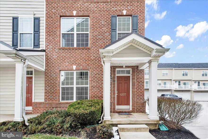 Rare five-bedroom townhome with 3.5 Baths  located in the popular Darley Green community. This spacious end-unit with abundant natural light offers a flexible layout designed for today’s lifestyle, including space for guests, a home office, or additional living needs.
Just a few years young (2015) this move-in ready modern home features a two-car garage and an entry-level bedroom with generous closet space and ANOTHER bathroom already roughed in—ideal for a private home office or guest suite. This level also provides direct access to the rear-entry two-car garage with door opener and utility closet.
The main living level features a spacious open floor plan with an open-concept kitchen and living space designed for comfortable everyday living and entertaining. The kitchen includes hardwood floors and upgraded finishes, 42-inch cabinets, granite countertops, a large entertaining island with granite countertops, a double deep stainless steel sink, microwave hood, brand-new stainless refrigerator  (2026) , and abundant cabinet storage including a pantry closet. The living and dining areas flow easily together, creating a bright and welcoming environment.
Step outside to the private balcony for outdoor living and enjoy fresh air and relaxing views.
Upstairs you will find three additional bedrooms with multiple walk-in closets and convenient access to the laundry closet. The primary bedroom includes its own bath and generous closet space, while the additional bedrooms are served by a full hall bath.
The top-level loft suite with private bath offers exceptional flexibility and could function as a second primary suite, guest retreat, or private workspace. This level also includes a walk-in closet, additional storage space, and energy-efficient two-zone HVAC providing comfortable climate control throughout the home.
 Recent updates include new carpeting, fresh paint throughout the interior,  new flooring in the bathrooms, some lighting updates and the new refrigerator
The association provides low-maintenance living by handling ground and community maintenance, allowing homeowners to enjoy the lifestyle.
Darley Green is a walkable community with sidewalks, a local library,  parks, and open green space. Residents enjoy easy access to the Claymont Train Station and convenient access to I-95 and I-495 for commuting. The home is minutes from the Claymont revitalization district and close to shopping, dining, and everyday conveniences along the Naamans Road shopping corridor. The location also provides easy access to major employers in Wilmington and a quick commute to Philadelphia. NOTE: County records are inaccurate on beds, baths  square footage.  Buyer should complete their own due diligence finished living space and amenities.
Enjoy a thoughtfully designed lifestyle community with modern townhome living, tree-lined streets, neighborhood gathering areas, and access to nearby parks and community services.
Just move in and enjoy.