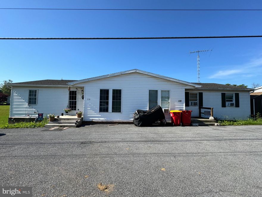 DUPLEX! Fully rented with leases in place. This Ranch style duplex has 3BR/1BA on each side. Shared basement for storage with outside access only. Large gravel parking pad with multiple parking spaces.