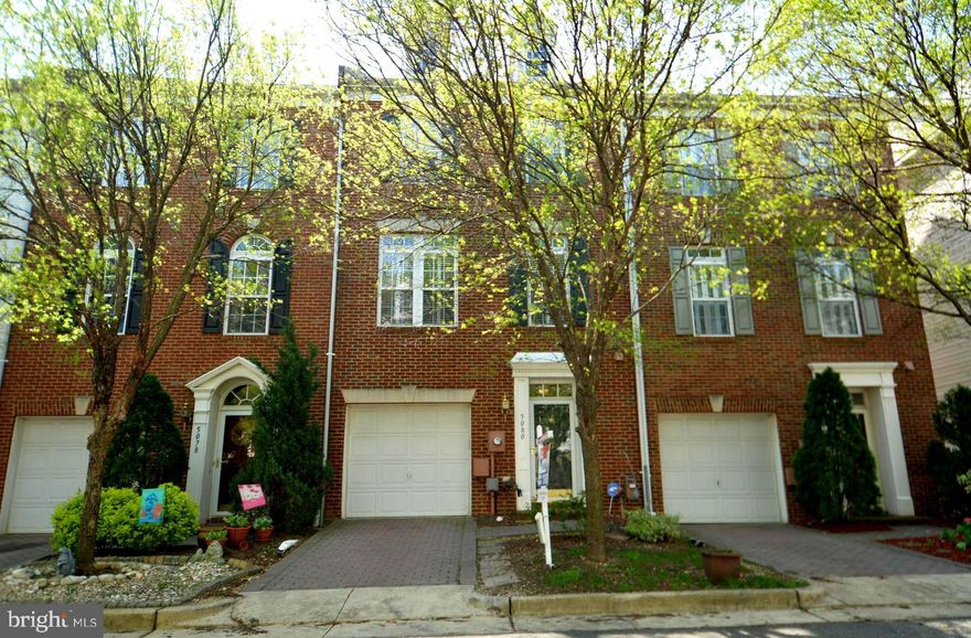 Rarely available FRANKLIN model with bump outs in all 3 levels, featuring upgraded kitchen with maple cabinets and SS appliances, hardwoods, plantation shutters, cozy gas fireplace in family room, one car garage with full driveway, spacious primary bedroom with sitting area and large walk in closet, lower level rec.room with office/den (can be used as 4th bedroom). New windows in main level and new sliding glass door. Neutral paint throughout!