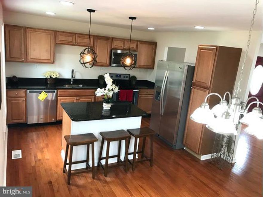 Stunning remodeled 4 bed/3 full bath, garage, single family house. New roof, siding, windows, doors, kitchen, bathrooms, hardwood, carpet, paint, HVAC, light fixtures, and appliances. Large fenced back yard with deck & sunroom porch. Basement wet bar can turn into 2nd kitchen for extra living area. New sliding doors going to sunroom. Close to I-495, MGM, National Harbor.