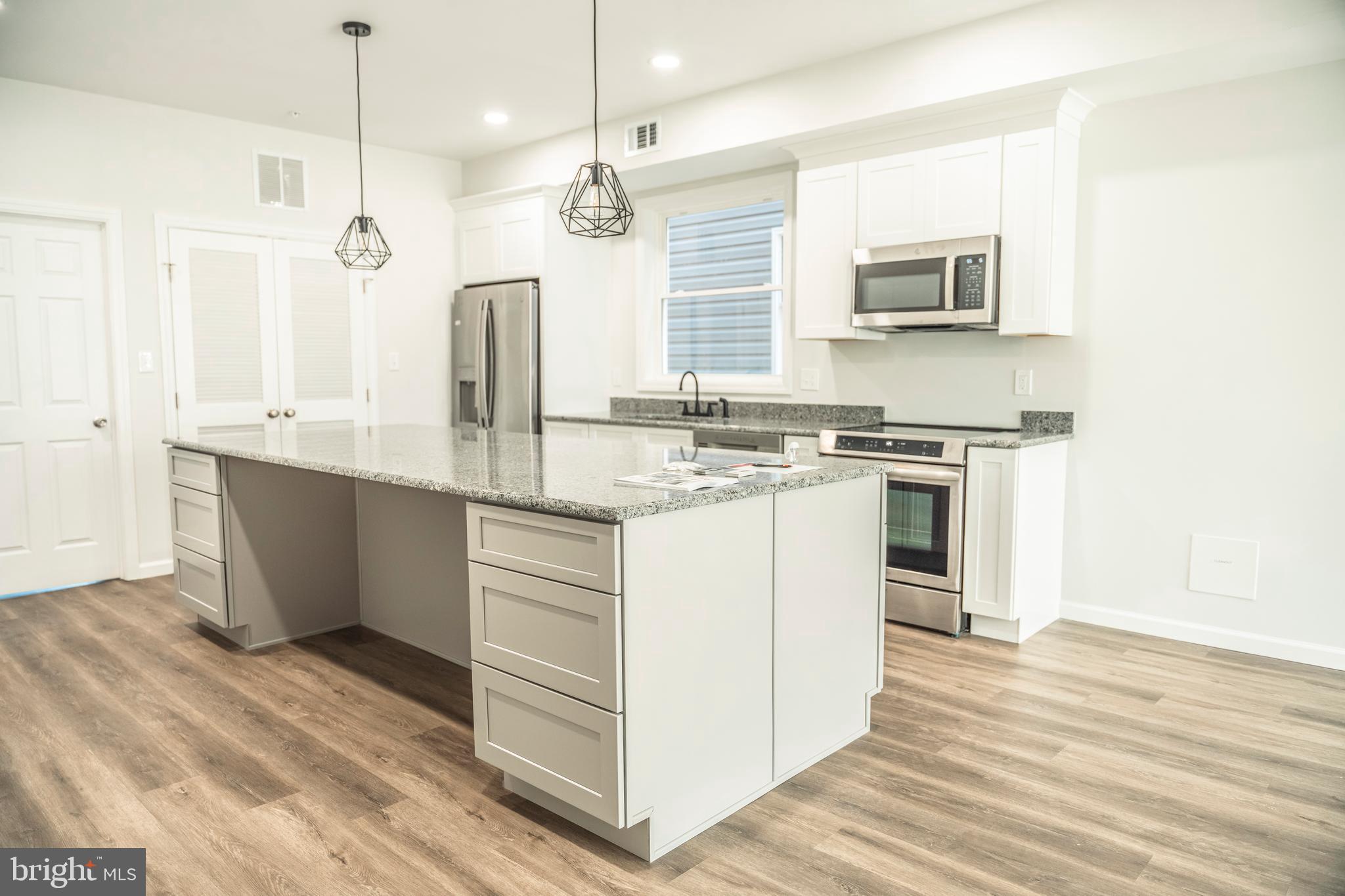 Stunning Newly Built Duplex in the Heart of Cumberland, MD! Welcome to this beautifully crafted 4-bedroom, 3-bathroom duplex, offering modern comfort and style in the revitalized city of Cumberland, Maryland. This home boasts an open kitchen floor plan with sleek stainless steel appliances, elegant granite countertops, and contemporary light fixtures, creating a warm and inviting space perfect for entertaining.
Designed with both functionality and luxury in mind, this home provides spacious bedrooms, spa-inspired bathrooms, and ample natural light throughout. Whether you're a growing family or looking for an investment opportunity, this duplex is a perfect blend of modern living and historic charm. Why Live in Cumberland? Nestled along the Potomac River, Cumberland serves as the commercial and business hub for Western Maryland and the Potomac Highlands of West Virginia. The city is undergoing an exciting revitalization, with efforts focused on downtown restoration, new business development, and improved infrastructure, making it a fantastic place to call home. Enjoy easy access to: Thriving local shops, restaurants, and cultural attractions, Beautiful parks and outdoor recreation, including the Great Allegheny Passage, Convenient commuter routes to larger metropolitan areas and A strong sense of community with a growing economy. Don’t miss your chance to be part of Cumberland’s bright future while enjoying the perks of a newly built, modern home. Schedule your showing today!