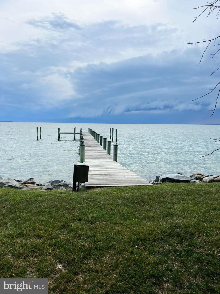 Stately brick pillars greet you at the tree-lined driveway that welcomes you to "Cedar Cottage"!  This incredibly unique waterfront oasis offers the most spectacular views of the Choptank River.  The elevated lot provides a protected shoreline and pier.  The 2 bedroom /2 bath cottage exudes charm and comfort to make this the perfect primary home or vacation home. Adjacent to the the cottage is a 1 bedroom/1 bath guest cottage . A storage shed and an attached 2 car garage with artist's studio complement the private,  wooded grounds.