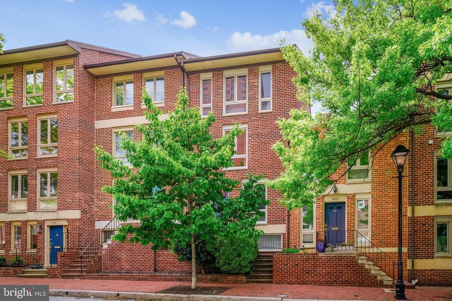 This bright and sunny four story Townhome features 3 to 4 Bedrooms, 2.5 baths, a double sided wood-burning fireplace, an open family dining room floor plan, a white updated kitchen with Quartz countertops, and a spacious sunroom perfect for enjoying an early morning cup of coffee or an evening cocktail.  
It is located in the heart of the highly sought after Otterbein, a very beautiful and centrally located neighborhood of historic row-homes in Baltimore City and within walking distance of several beautiful parks, as well as a short walk to the Inner Harbor, close to the  business district, Federal Hill shops and restaurants, Otterbein Swim Club (access with paid membership), Ravens Stadium, Camden Yards, the Light Rail and the MARC train for an easy commute to Washington DC.