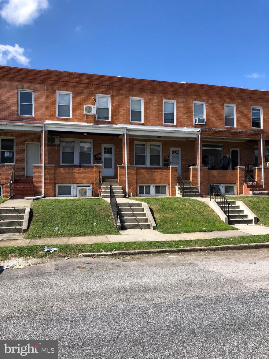 Open house Saturday 1-3 only showings allowed. Ready for its new owners, great for you to move in and rent one of the floors to help with your mortgage, rental property, or convert back to single dwelling. Electric has separate meters.  Handy man special or great for a rehabber.  Spacious covered porch. Top floor has kitchen, living room, full bath and one bedroom, partial HW floors.  Main floor has separate front and back entrance with a parking pad for a SUV.  Hardwood floors, spacious living room/dining open plan, kitchen, lower level has bedroom, full bathroom, and laundry room.  Conveniently located to Eastern Ave, Bayview Hospital, shopping centers, 895/95 and downtown areas. House is sold as is, owner currently lives on main floor, 2nd floor apartment vacant. t Open house 10/10/20 1-3p.m.