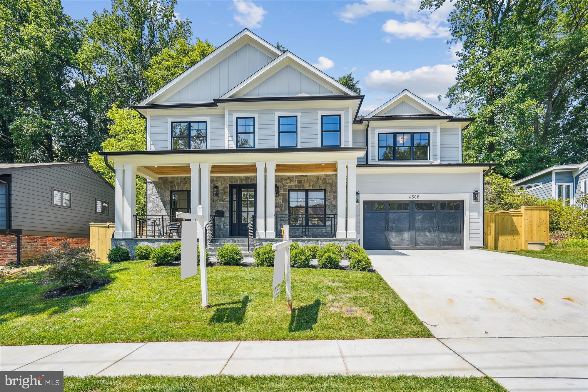 Exquisite, brand new home built by esteemed builder, ERB Properties. This home offers an outstanding open floor plan with 3 finished levels, 7 bedrooms, 6.5 bathrooms and over 5,600 square feet of living space! Featuring upscale craftsmanship and finishes, abundant recessed lighting, wide plank hardwood floors, custom moldings and plenty of windows to let in the sunshine, it is ready for you to move right in! On the main level you will find an inviting living room, a formal dining room, a gourmet chef’s kitchen with high-end appliances, soft close cabinets & drawers, quartz countertops, an island with waterfall counters, a pantry and a breakfast area. A light and bright gorgeous family room with a gas fireplace leads out to a lovely deck. The main level also features a guest bedroom with a full bathroom, a mudroom with cubbies and a bench off of the two-car garage and a powder room. The spectacular upper level includes a relaxing primary suite with an oversized custom walk-in closet, a luxurious spa bath with a separate frameless glass enclosed shower, soaking tub and two sinks. Also on the upper level are 3 additional bedrooms, each with their own private full bathroom, a family/homework-study area and a laundry room with a sink, cabinets, washer and dryer. On the fabulous walk-up lower level you will find a delightful recreation room with a wet bar and beverage refrigerator, two bedrooms, a full bathroom, an exercise room with a mirror and rubber floor, an extra storage area and a separate side entrance. Located in the sought after Wilson Knolls subdivision, this home is part of the Walt Whitman High School cluster.