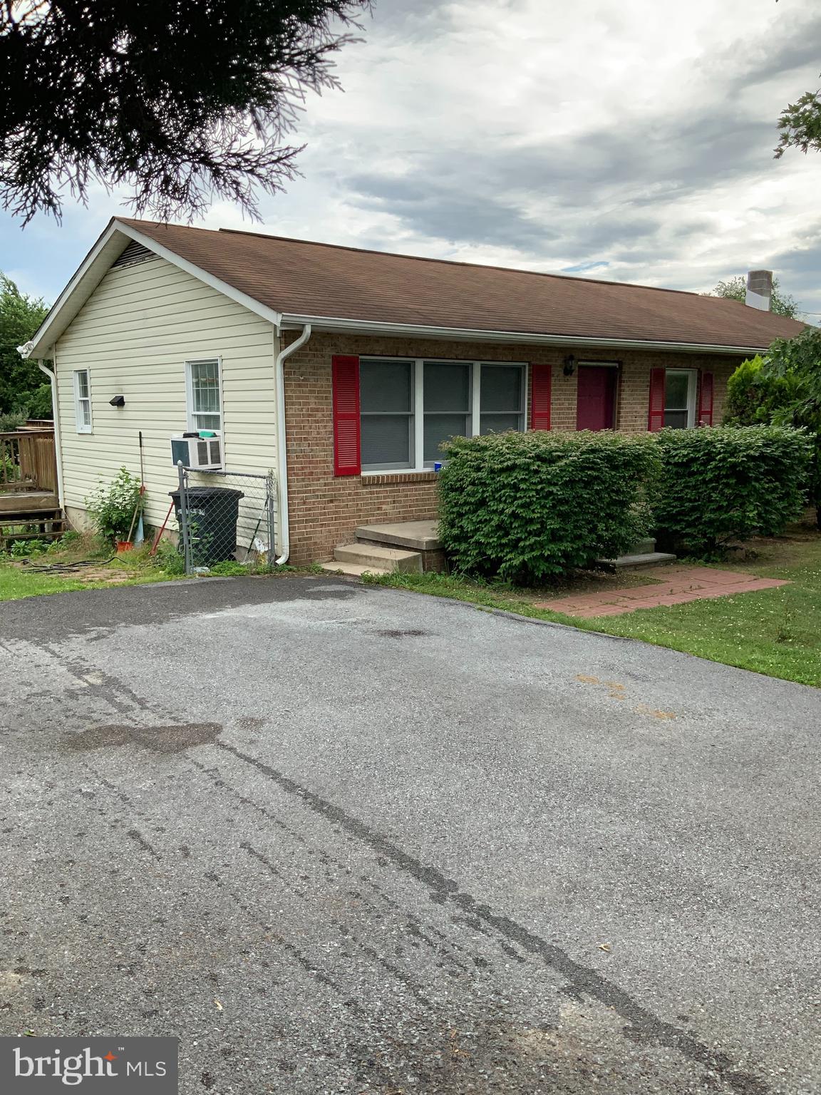 MOTIVATED SELLER! Brick rancher in an established neighborhood. Fixer upper with the renovation plans available. Over 2000 sq ft. You could finish the basement for more sq ft. plus it has a basement garage for that project car or truck.