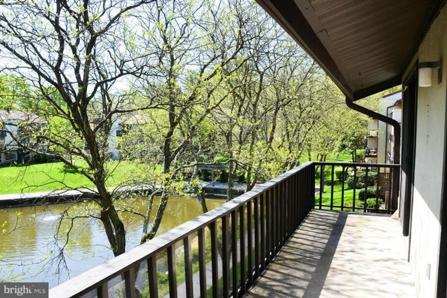 Come home to The Cove! This third floor 2 bedroom/2 bath unit features a fabulous view of Wilde Lake as well as a newly updated kitchen to include granite counter tops and stainless steel appliances.  Washer and dryer in unit.  Minutes from The Columbia Mall, Howard County Community College and major commuter routes.  Community pool too! HOA is CPRA