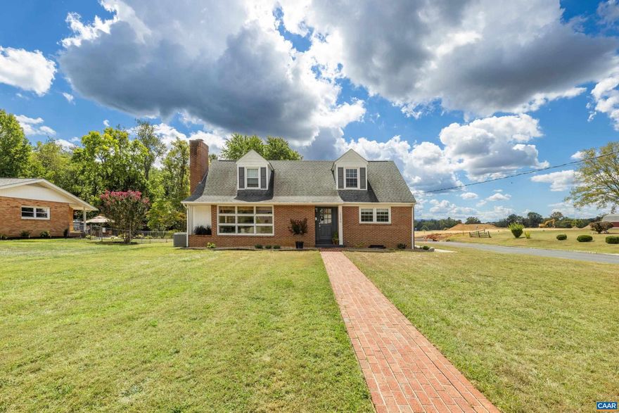 Welcome to this beautifully renovated home in the heart of Waynesboro! Situated on a spacious .4-acre corner lot, this property blends modern updates, timeless finishes, and a convenient location less than 1.5 miles from I-64. Inside, you?ll find an open floor plan with refinished wood floors, custom shades, fresh paint, and abundant natural light. The chef?s kitchen is a true highlight with quartz and Italian marble countertops, new cabinetry with soft-close doors and dovetail joinery, a walk-in pantry, a hidden microwave cabinet, a stainless sink with pull-down faucet, and top-of-the-line appliances, including a Frigidaire induction cooktop, a GE wall oven, a dishwasher, and a French-door refrigerator. The main-level primary suite offers a walk-in closet and spa-like bath with a double vanity, a walk-in shower, and a separate water closet. Other features include new HVAC, electric fireplace, built-in shelving, finished laundry, and a huge unfinished basement with exterior entry. Completing the home are a two-car garage, carport, whole-house generator, screened porch, and beautifully refreshed landscaping?move-in ready and designed for modern Shenandoah Valley living.  Schedule a private tour today.,Glass Front Cabinets,Marble Counter,Quartz Counter,Wood Cabinets,Fireplace in Living Room