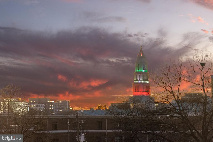 Discover this spectacular and rarely available corner-unit condo in the heart of Old Town Alexandria. Just a 5-minute walk to the Braddock Road Metro Station, this beautifully updated residence offers effortless access to Washington, D.C., while surrounding you with the vibrant lifestyle that makes Old Town so special — waterfront strolls along the Potomac, boutique shopping, acclaimed dining, weekend farmers markets, and charming cobblestone streets right outside your door.

Inside, this light-filled home features hardwood floors throughout and an open floor plan designed for both everyday living and entertaining. The gourmet kitchen features 46" cabinetry, granite countertops, a spacious eat-in island, stainless steel appliances, a pantry, hands-free counter lighting, and an under-sink water filtration system — blending style with smart functionality. The spacious corner design welcomes abundant natural light from multiple exposures, complemented by custom remote-controlled shades with a top-down/bottom-up feature to create the perfect balance of privacy and ambiance. This home offers two private bedroom suites, each with hardwood floors and a full bath.  Adding even greater peace of mind and comfort, the home features a brand new HVAC system, ensuring energy-efficient climate control year-round. Additional highlights include a secure building, one oversized assigned garage parking space, a storage locker, and communal bike storage — perfect for enjoying the active, walkable Old Town lifestyle. Experience refined living in one of Northern Virginia’s most sought-after neighborhoods — where history, community, and convenience come together beautifully.