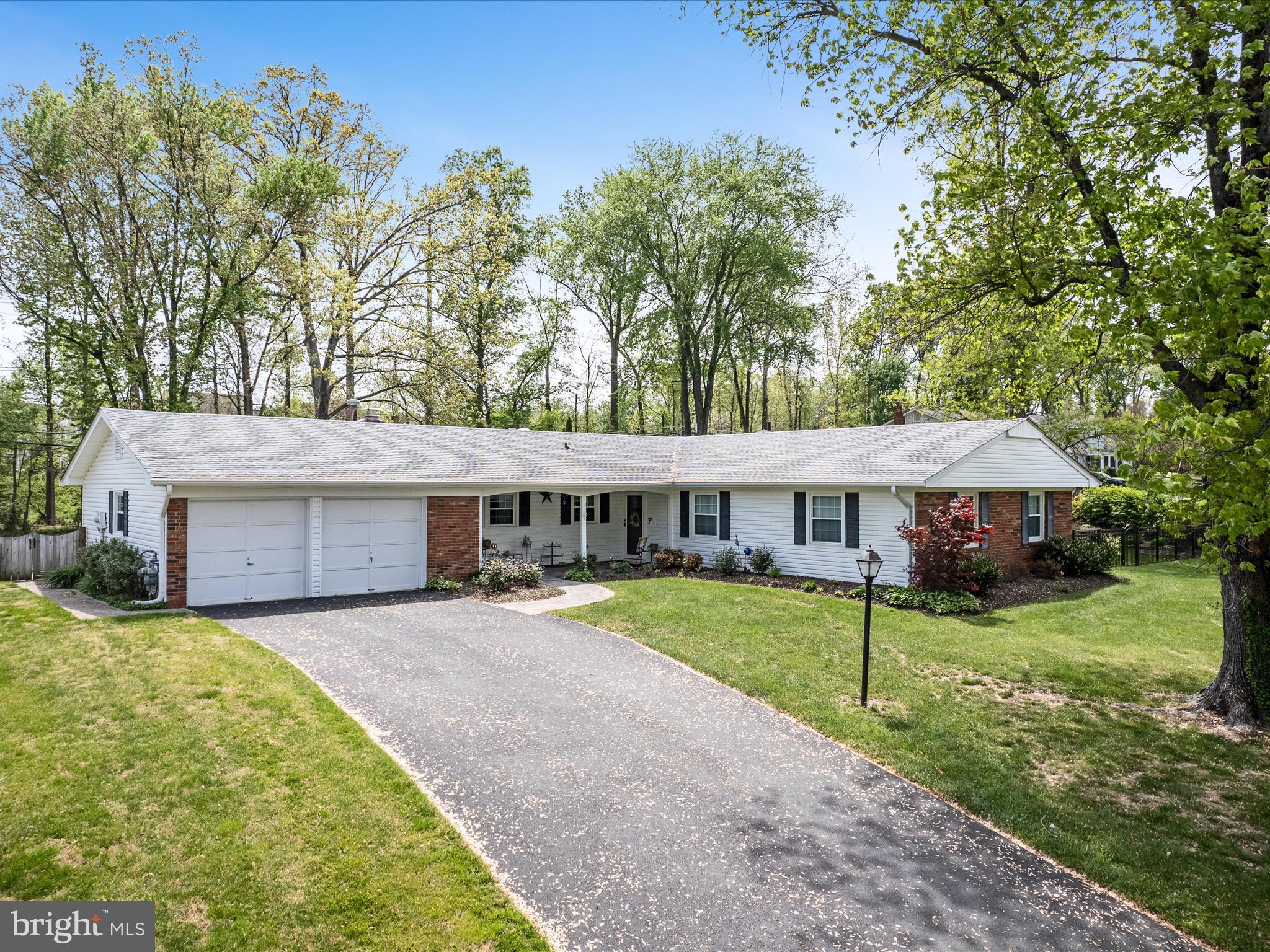 We welcome you to come visit the popular Jefferson model, ranch-style home in one of the most sought-after neighborhoods in Chantilly, VA! This home in Greenbriar boasts a spacious, single level living layout, with 4 large bedrooms and 2 full baths. The kitchen is updated with granite countertops and newer appliances. The patio doors in the kitchen were installed in (2022) The primary suite full bath was remodeled in 2019 with a longer countertop and tiled floor. In addition to the roomy interior, enjoy the screened-in back porch with beautiful views of nature and an occasional strolling deer, built in 2021. Other features include, a culligan reverse osmosis filtration system connected to the sink and refrigerator (2020), a whole home generac generator (2020), a water re circulation system (2018), a whole home surge protector (2022), new HVAC and furnace (2023), converted gas fireplace (2020), new roof installed (2018), new driveway in (2020) and re sealed in (2024). Additionally, all of the closets have adjustable organizer systems built in. Outside, you will find one of the largest corner lots in the Greenbriar community with over 23,218 sq ft, lined on both sides with a privacy fence. As an added piece of mind, the original sewer pipe was replaced from the home out to the street (2019). You won't want to miss out on this spectacular, rare find!!