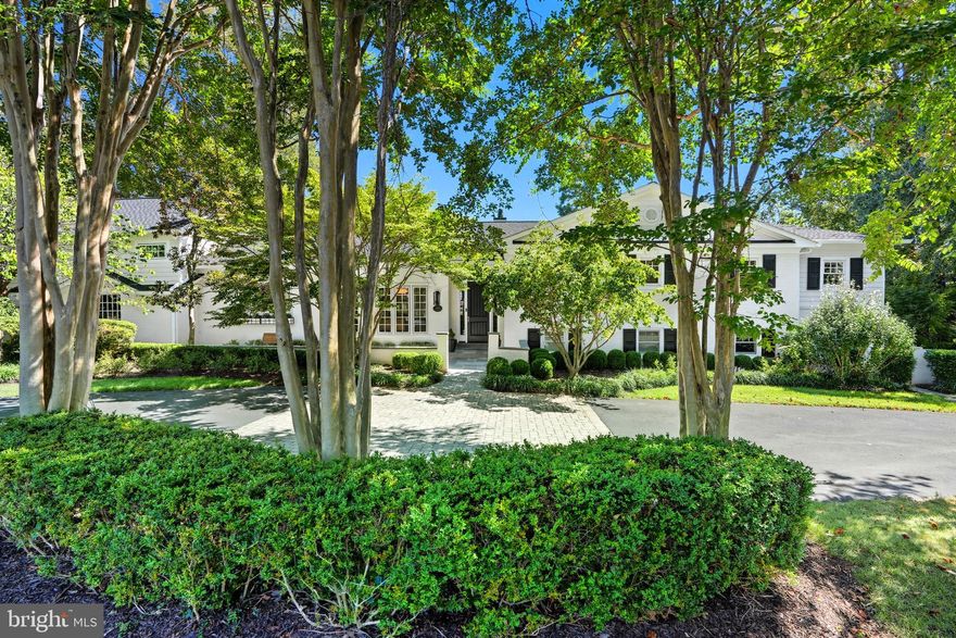 An Entertainer’s Paradise

Thoughtfully designed and beautifully updated, this stunning home is perfectly positioned on a picturesque one-acre lot. The exterior is a true retreat, featuring a sparkling heated pool and spa with an automatic cover, expansive patios, and lovely gardens. Active enthusiasts will appreciate the newly added pickleball and sport court, which even includes dedicated space for spectators. A welcoming foyer opens to rich hardwood floors spanning two levels, setting the tone for a lifestyle that is both elegant and comfortable. The open-concept floor plan showcases dramatic volume ceilings and meticulous attention to detail, with sleek finishes and generous living spaces filled with natural light throughout.

The main level is anchored by an updated chef’s kitchen equipped with stainless steel appliances, adjoining a comfortable breakfast room and an oversized family room. For more formal occasions, the home offers a lovely living room and a separate dining room. Exceptional details abound, including two cozy fireplaces, custom built-in shelving, and French doors leading to a spacious deck that overlooks a large, fenced backyard offering total privacy. Functionality meets style in the renovated mudroom and laundry suite just off the kitchen, which features a custom dog bathing station, a walk-in pantry, and built-in cubbies leading to the oversized two-car side-load garage.

The upper level serves as a sophisticated sanctuary. The primary suite offers a serene escape with a separate sitting area and two large walk-in closets. Its spa-inspired bath is finished with marble floors, dual vanities, a jacuzzi tub, and an oversized marble shower. An additional bedroom with a private en-suite bath is also located on this level, while a separate bonus suite on the opposite side of the home above the garage provides a massive bedroom, en-suite bath, and two more walk-in closets. The sunlit walk-out lower level is equally impressive, featuring a recreation room, a private guest bedroom with an en-suite bath, a quiet home office with garden views, and a dedicated pool bath for easy outdoor access.

The location is truly unbeatable, situated just minutes from the world-class shopping and dining of Tysons Corner and less than a mile from the Spring Hill Recreation Center. Commuting is effortless with quick access to the Dulles Toll Road, I-495, the GW Parkway, and downtown DC. Furthermore, the home is ideally positioned between Washington Dulles International and Ronald Reagan National airports, offering outstanding convenience for travel. Located within the top-rated Spring Hill Elementary, Cooper Middle, and Langley High School districts, this is more than just a house—it is the perfect place for your next chapter.