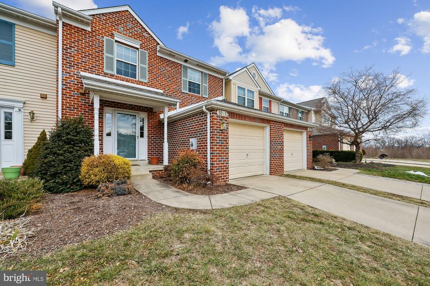 *** Coming soon- Showings start Thursday February 26th  *** Beautiful brick-front garage townhome in the highly sought-after Waterside community, backing to open green space and just steps from the scenic Monocacy River walking and biking trails. Enjoy a peaceful, low-maintenance lifestyle in a quiet setting with easy access to commuter routes and everyday conveniences.

The bright, open main level features hardwood flooring throughout, spacious living and dining areas ideal for entertaining, and an eat-in kitchen with elegant marble countertops, ample cabinetry, and clear sight lines into the main living space. Step outside to a private deck overlooking tranquil common area views — perfect for morning coffee or relaxing evenings.

Upstairs, the vaulted primary suite offers a walk-in closet and private bath, creating a comfortable retreat. Two additional bedrooms, a full hall bath, and convenient upper-level laundry complete the upper level.

The fully finished walk-out lower level provides flexible space ideal for a family room, home office, gym, or recreation area, plus an additional bath, extra storage, and direct access to the backyard — perfect for remote work or multi-use living.

Waterside residents enjoy resort-style amenities including a community pool, pickleball and tennis courts, playgrounds, and miles of walking paths connected to the Monocacy River trail system.

Ideally located just minutes to Wegmans, shopping, dining, historic Downtown Frederick, Route 15, I-70, and commuter routes.

NO CITY TAXES — offering additional monthly savings.