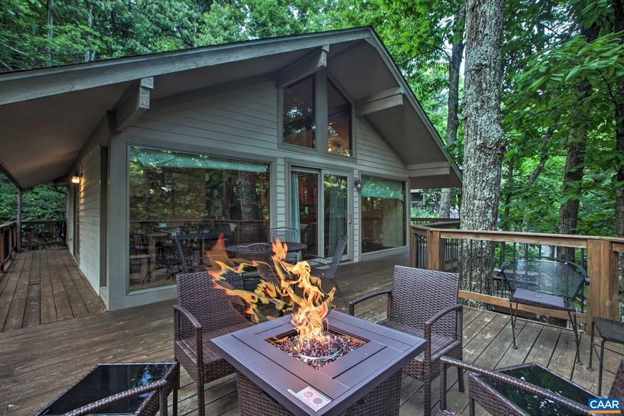 Escape to the mountains with this charming three bedroom, two bathroom retreat nestled in the heart of Wintergreen Resort.     This cozy getaway features an updated kitchen and bathrooms that blend modern convenience with mountain living.  There is a bonus sleeping loft that offers two additional beds.  The living room and den allow for two different entertaining spaces. An oversized deck maximizes outdoor living with seasonal views and a tree house vibe in the summer to escape the city heat.  The patio is the perfect place for a future hot tub.     Come see why Wintergreen Resort is the perfect jumping off point for your Nelson County and Blue Ridge adventures.,Granite Counter,Wood Cabinets,Fireplace in Den,Fireplace in Living Room