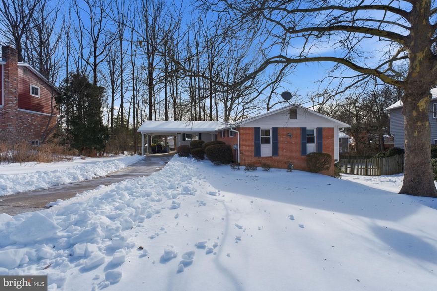 Welcome to 10125 Commonwealth Blvd! This property offers one-story living with a well‑designed layout, a walkout basement, and a large, fenced backyard in the highly sought-after Kings Park West community. Upgrades include a new roof in 2015, new windows in 2006 (top floor) and 2012 (basement) and a new hot water heater in 2022. Residents enjoy miles of wooded trails, several community pools, playgrounds, and Lake Royal’s scenic loop for walking, running, or kayaking. The neighborhood feeds into Fairfax County's Robinson Secondary School with a 7/10 Great School rating, and Laurel Ridge Elementary, a Fairfax County magnet school offering a Gifted and Talented program.  For ease of commuting, the home sits just minutes from the Burke Centre VRE station and multiple Metrobus routes connecting directly to the Pentagon and the Metro's Orange Line while nearby park‑and‑ride options make reaching the Vienna/Fairfax‑GMU Metro station a breeze. If you're looking for commuter convenience, great schools, outdoor recreation, and a vibrant community with long‑standing appeal, this house has it all.