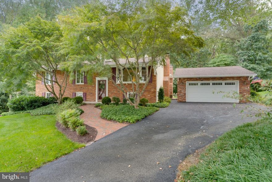 No showings until Saturday September 20th. Look no further...this is the one you've been searching for!!! This amazing home on a large double lot has been beautifully maintained and lovingly cared for by the current owners for over 50 years. Charming brick pavers, stepping stones and lovely plantings welcome you to this warm and inviting abode that has been expanded and remodeled over the years.  A spacious and light filled family room addition to the rear of the home in 1992 has become the central spot to gather. The cathedral windows provide glorious views of the lush and private back yard and the wood burning fireplace keeps things cozy inside. With open views of the extended Dining Room and wonderful Kitchen that was remodeled in 1999...this home is definitely not your average split foyer :) The kitchen cabinetry was custom built by Bennett Woodworking and you'll discover many appealing features including furniture style detailing, deep crown trim around the tops, a charming triangular corner shelf, 2 lazy susans, staggered heights, a microwave shelf at the perfect level, under cabinet lighting, tile counters and backsplash and recessed lighting. The kitchen stove was replaced in 2023 and the tile floors were installed about 2 years ago. There's also a casual dining space enhanced by a beautiful stained glass  fixture. The formal Dining Room was extended by 4 feet due to the addition of the FR and you'll discover wood floors and plenty of space for furniture and entertaining there. The formal Living Room is graced by a wonderful bay window framed by custom swags and jabots. The most recent upgrades to this unique home include the expansion of the Primary Bedroom and the remodeling of the 2 bathrooms on the main level. The Primary Bedroom was enlarged and now features an open California Closet system that the owners love...it provides a light, airy and modern upgrade to the room :) A freestanding piece has become a favorite of theirs since it provides flexible drawer space and a pull out hamper. The primary bathroom is a dream...offering a floor to ceiling gorgeous shower with all the bells and whistles, a lovely and soothing color pallet, sleek and modern cabinetry and countertops as well as good lighting. The remodeled hall bath features the addition of a linen cabinet with a pull out laundry basket, a new shower surround with detailing around the top and a grab bar, pretty cabinetry and counters, updated lighting, fixtures and tile accents.  2 more bedrooms complete the main level.  Downstairs you'll appreciate the additional recreation room with a 2nd fireplace and there's a half bath for your convenience. The ample unfinished space may allow for future expansion but it currently provides plenty of room for storage. A workshop space and the laundry area complete this level. Outside you'll discover a spacious deck that has been recently replaced and there's a lovely stone patio that invites you to relax and enjoy the lush landscape. The patio and deck furniture as well as the Charbroil gas grill are conveying with the home so you'll be all set for entertaining. There's a two car oversized garage...plus the storage area in the garage is great for the John Deere riding mower w/bagger attachment, garden tools and a Generac 6500 watt generator that the sellers are graciously conveying with the home. The driveway will also accommodate approximately 5-6 cars. The roof was replaced in 2016, the gas furnace was replaced in 2018 and the AC unit was replaced in 2021 and you'll find Anderson windows throughout that were replaced about 20 years ago. The sellers have also enjoyed using the whole house fan. There is so much to love and appreciate in this wonderful home and although amenities such as shopping, schools, houses of worship and commuter routes are right around the corner...you'll feel like you took a trip to the country when you step inside the front door :) So  come out and take a look...this may just be your new home!