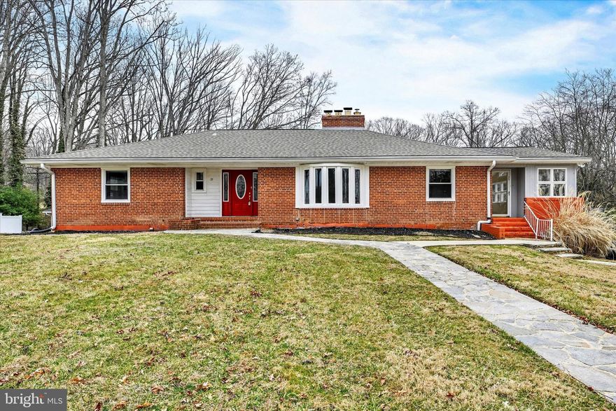 Welcome to this exceptional 5-bedroom, 3-bath rambler in the heart of Randallstown, MD, perfectly situated on a spacious 1/2-acre corner lot. This all-brick home features a bright and spacious floor plan, offering ample space for both relaxation and entertaining. The main level boasts wood floors in the living and dining rooms, an updated kitchen with modern countertops, cream/off white cabinets, an island, stainless steel appliances, and a breakfast area. The formal dining room adds an elegant touch for hosting gatherings. The primary bedroom suite offers relaxation and elegance, including a modern bathroom and ample closet space. Two sizeable secondary bedrooms and a comfortable bath complete the main level. The kitchen opens to a huge rear deck, perfect for outdoor gatherings or enjoying wildlife. 
The home also includes a sun drenched all-seasons room, ideal for year-round enjoyment, and three cozy fireplaces—two on the main level and one in the finished walkout basement. The basement provides even more living space with two additional bedrooms, a full bath, laundry room and a spacious recreation area, making it perfect for guests, a home office, or a multi-generational setup.
Additional features include an attached side-entry 1-car garage, driveway for off street parking, and built in (attached) shed, perfect for storing mowers or lawn equipment. The home is equipped with all appliances, including stainless kitchen appliances, a washer and dryer, and bonus appliances such as an extra refrigerator and freezer. With its prime location, thoughtful updates, and versatile floor plan, this rambler offers the perfect blend of comfort and convenience. Schedule your private tour today!