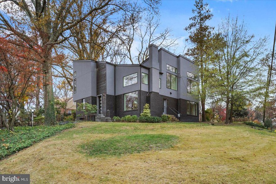 Welcome to this one-of-a-kind residence, totally rebuilt in 2024 and situated in the cozy Woodmoor neighborhood of Silver Spring. Just steps from St. Bernadette's Church and K-8 School and many other community attractions, this home seamlessly blends modern elegance with thoughtful and unique design. As you step through the main entrance, you're greeted by an expansive living room adorned with high ceilings and recessed lighting, creating a bright and inviting atmosphere. The gas fireplace serves as a focal point, complemented by skylights that bathe the space in natural light. The main level features pristine white oak hardwood floors, custom Pella picture windows, a versatile home office or fifth bedroom, and a sunroom with sliding glass doors and programmable heated tile floors for year-round comfort.

The heart of the home is the spacious, modern kitchen, equipped with top-of-the-line stainless steel appliances, including a Wolf gas cooktop, oven, convection/microwave oven, a Bosch refrigerator, and dishwasher. Sleek Dekton countertops and an appliance niche with LED strip lighting complete this stylish and functional space.

Ascending to the upper level via custom-built, white oak floating stairs, you'll find 4 spacious bedrooms including a luxurious primary suite, all featuring ceiling fans and custom closets. The primary suite is a true retreat, boasting a spa-inspired bathroom with a soaking tub, curbless walk-in shower with glass enclosure, programmable heated tile floors, Kohler fixtures, double sinks, and a bidet toilet seat. The Jack-and-Jill bathroom on the same floor includes a curbless walk-in shower, heated tile floors, and double sinks. A thoughtfully designed laundry room with a countertop, cabinets, drying rack, sink, and stacked full-size washer and dryer adds convenience to the upper level.

The finished basement offers flexible living space perfect for a recreation room or home theater and includes a powder room. Outside, the property features a patio and fenced backyard, ideal for entertaining or relaxation, along with a driveway and one-car garage for easy parking.

Situated on a corner lot, this home offers both privacy and a sense of community. Minutes from the 495 beltway, a 25 min drive from nation’s capital, and just off Route 29, your new home also has shopping and recreational experiences less than a mile away: Woodmoor Shopping Center, North Four Corners Park, Burnt Mills Park and Trails, Trader Joe’s, Montgomery Blair High School and Pinecrest Elementary. Additional nearby amenities less than 3 miles away include Downtown Silver Spring, Forest Glen and Silver Spring Metro stations, the FDA, Holy Cross Hospital, and Sligo Creek Golf Course.

This fully custom home with its exceptional features and prime location is truly a rare find, come see for yourself!