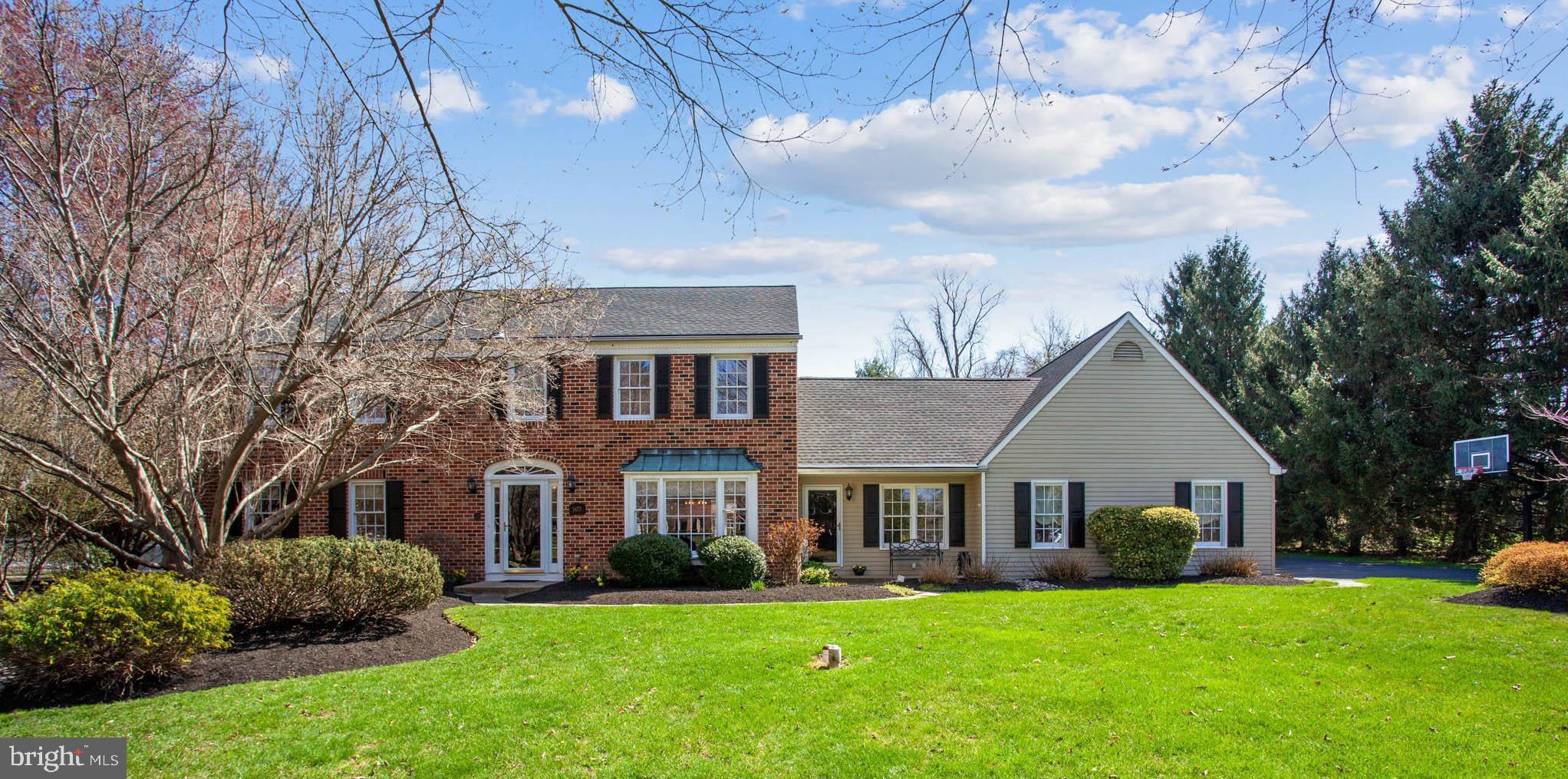 PICTURE PERFECT!!!!  Welcome home to this immaculate and meticulously maintained and updated 4/5 bedroom home in the desirable Mirror Lake Farm neighborhood!  Ideally located on a premier one-acre level lot, this traditional home has wonderful flow, and is perfect for entertaining! This exceptional home is in pristine condition and sparkles throughout! As you approach the home, appreciate the winding bluestone walkway that leads to the entrance of this lovely colonial. The center hall opens to the spacious formal living room and steps down to the elegant dining room with hardwood floors, custom millwork, and a beautiful bay window. The sun-filled updated kitchen features granite countertops, two ovens, stainless steel appliances, hardwood floors, and opens to the large eat-in kitchen with a lovely bay window, perfect for enjoying your morning coffee!  Watch the big game in the enormous great room with gleaming hardwood floors, custom cabinetry, accented with wood burning full masonry fireplace, beamed ceiling, and a large bay window. Walkthrough a bright and airy three-season sunroom to the gorgeous bluestone patio overlooking the stunning parklike backyard. This magnificent backyard is a nature lover’s delight and is surrounded by mature trees and professional landscaping! A perfect place to relax and unwind!   A study or fifth bedroom, updated powder room and a huge laundry room complete the first floor. Easy access to the two-car attached garage with stairs to attic and separate entrance to yard. Upstairs, the elegant primary bedroom is complemented with two large walk-in closets and a stunning en-suite master bath with double vanity, custom cabinets and decorative tile inlay. Three additional bedrooms of generous size and a beautiful updated hall bath complete the second floor. The finished basement has a great multi-purpose recreation area and separate storage space. This home has many special features that make it stand out from the rest, newer roof with Gutter Helmet, central vac, two-zone heating and air conditioning, walk-up attic, water softener, alarm system and easy clean tilt in windows and possible space for bonus room over garage.  Conveniently located within walking distance to Edgewood Village, minutes to downtown Yardley Boro, I95, US1 and trains to NYC and Philadelphia.