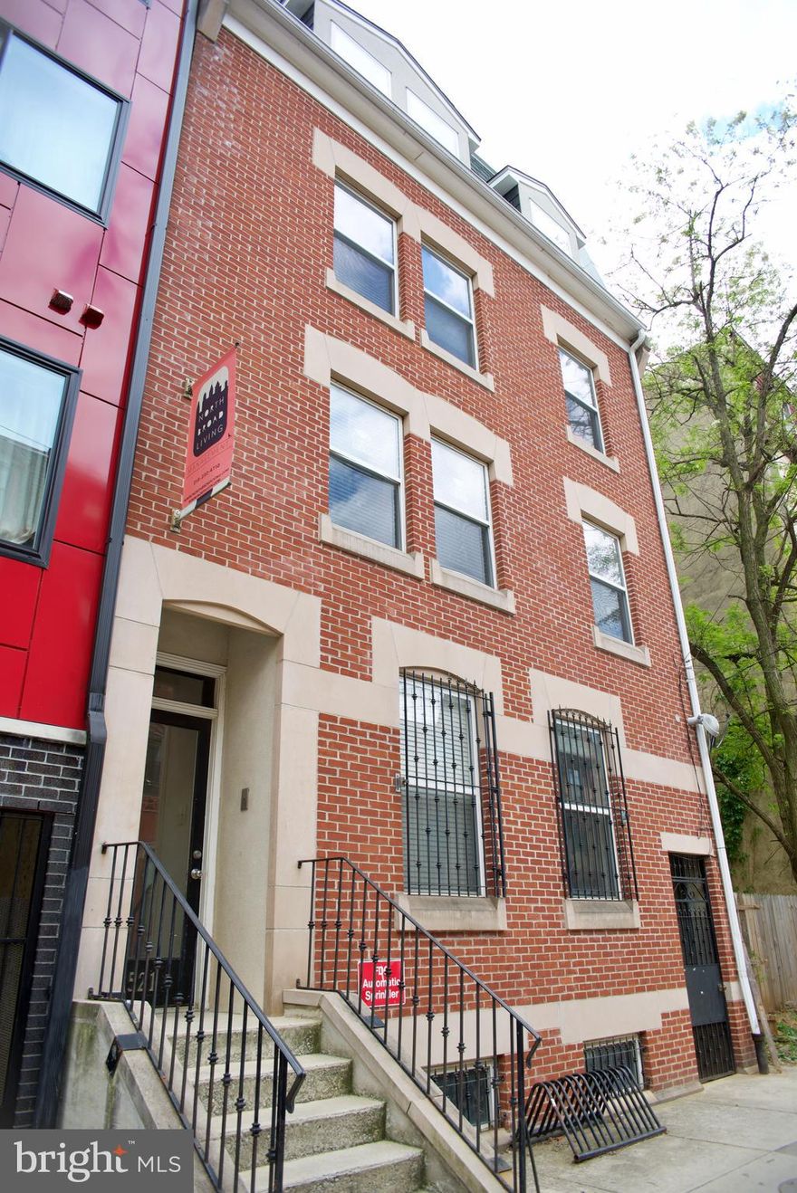 Temple University off-campus student housing investment opportunity in A++ location!  Located on one of the best blocks on campus, one block from Morgan Hall, in the heart of Main Campus.  Well-maintained eight-unit property, with a ten year operating history at 100% occupancy.  This property consists of an ideal unit mix that is easily leased, which includes seven 2-bed/1 bath and one 1-bed/1 bath totalling 15 beds.  Gas and electric utilities are separately metered and paid by tenants.  Spacious layouts with hardwood floors throughout and a private enclosed outdoor area for one unit.  New roof coating just completed at the end of 2020.  Bring in additional money each month with commercial coin operated laundry machines housed in the brightly lit and clean lower level, easily accessed by all tenants.   All units fully leased for the 2020-21 school year and completely fully leased for 2021-22 with a 3% rent increase as well!  Great income producing opportunity with an annual gross income of $138,300!    A value-add opportunity, upgrading kitchens and bathrooms will allow the next owner to increase rents even further.  With this location, and unit mix it will not last long!  Step right in and start collecting income!  Schedule your showing today before this opportunity is gone!