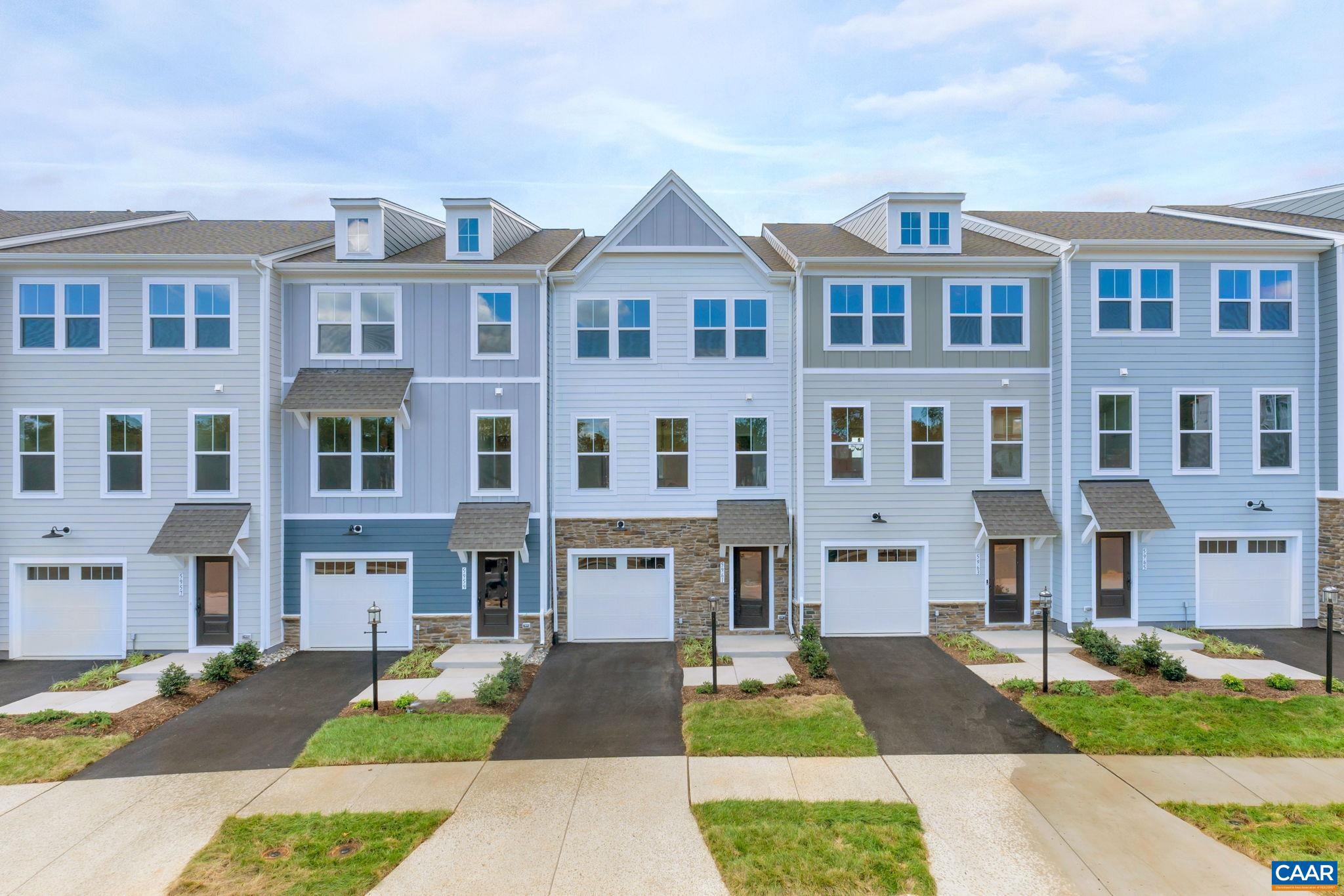 Explore the 3-bedroom, END UNIT, Lucas townhome at Pleasant Green? oversized 1-car garage?with an Oct/Nov 2025 estimated completion. Designed for comfort and convenience just steps from Downtown Crozet, this 3-level, 2 full bath, 2 half bath home features thoughtful, flexible spaces throughout. The entry-level recreation room with a .5 bath offers a private retreat, home office, or guest suite with interior garage access. On the main level, enjoy open-concept living with LVP flooring, a spacious living room, and a kitchen with GE� stainless appliances, quartz counters, large island, and dining area that opens to a private rear deck?ideal for relaxing outdoors. Upstairs, the primary suite includes a walk-in closet and private bath with dual vanities. Two additional bedrooms, a full bath, and bedroom-level laundry provide everyday convenience. Exterior details include Hardie� siding, HOA-maintained lawn care, and peace of mind with new home warranty coverage. Community amenities: fire pits, renovated clubhouse, playground. All walkable to shops, dining, and scenic trails. Visit our model home today! *Photos of similar homes; some images may be virtually staged.,Painted Cabinets,Quartz Counter,Solid Surface Counter,White Cabinets