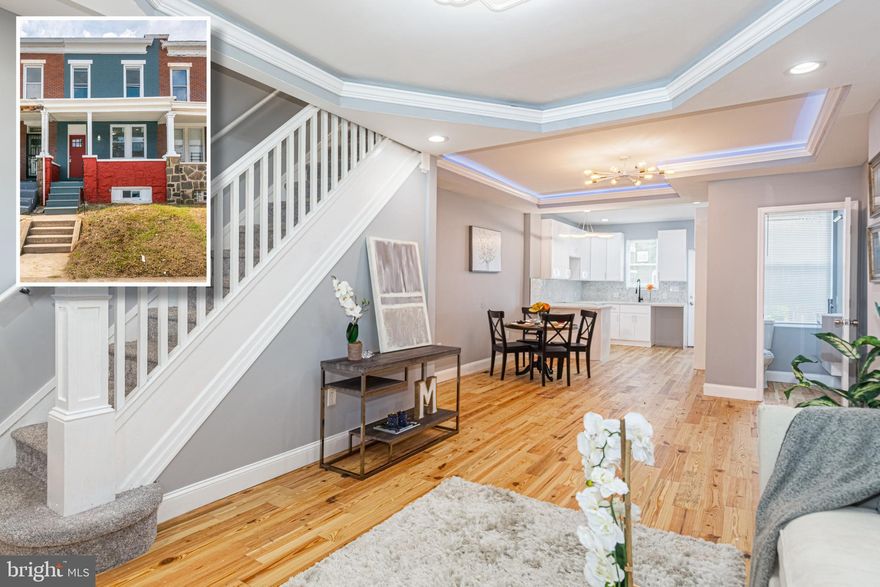 INCREDIBLE VALUE FOR THIS LARGE PORCH FRONT ROWHOME WITH 3 FINISHED LEVELS AND OFF STREET PARKING!  Open floor plan with hardwood floors throughout the main level, spacious living room and separate dining area with tray ceilings with rope lighting, designer kitchen with granite counters, and tile backsplash, upper level Primary bedroom suite with a full bath, and 2 additional bedrooms with a shared bath, fully finished basement with a large family room, 4th bedroom, and a full bath, and a rear patio with off street parking.  Punch out items and appliances to be installed prior to settlement