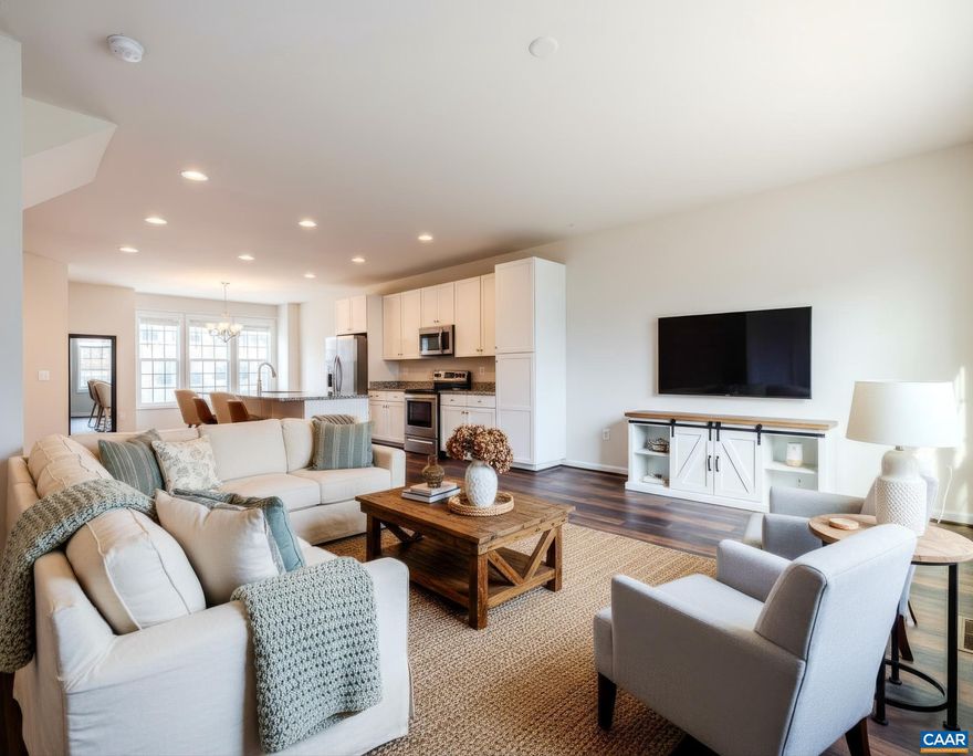 Townhome in city of Waynesboro featuring a well-equipped attached three-level, three-bedroom layout with a one-car garage, ready for immediate move-in. Ideal for entertaining, it offers over 1,850 finished square feet, including granite countertops, a spacious kitchen island, tile bathrooms, a dual vanity with a step-in shower, and a large walk-in closet. The first floor has a recreation room. Enjoy barbecues on the deck. The HOA fee covers lawn care, snow removal, and exterior maintenance, including the roof. Please note, the photos are digitally staged; the home does not include furniture.