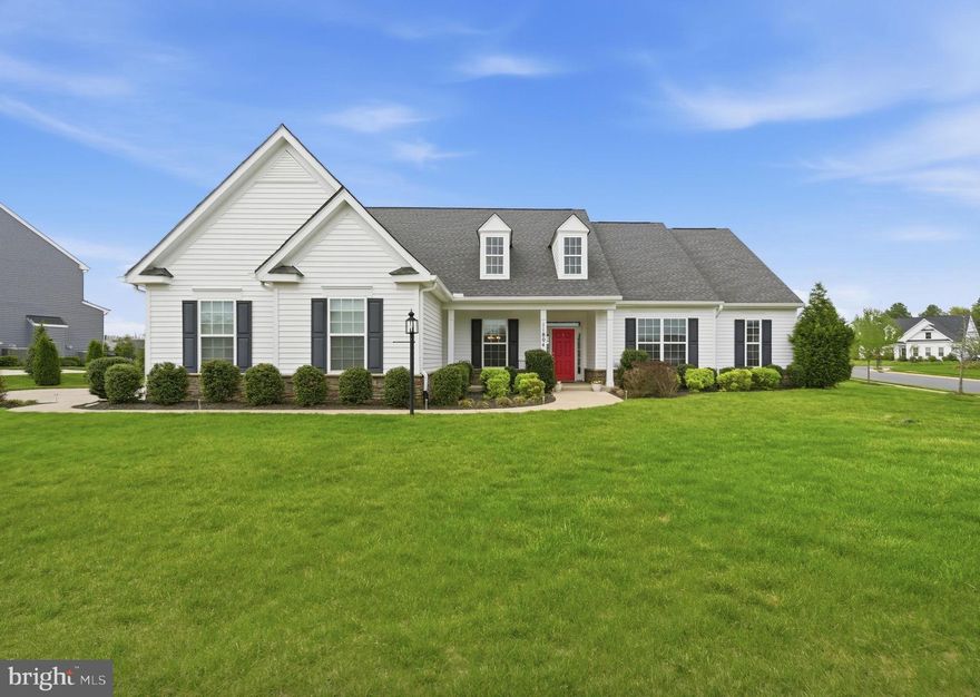 This beautiful Cottage Dream Home is located inside the luxurious, gated  lake and golf  community of Fawn Lake in Fredericksburg.  
Featuring an ideal open concept floor plan crafted with luxury elements designed for today's modern lifestyle. This like-new Chesapeake model from Atlantic Builders with 2585 SQ FT of exceptional interior space  is designed for easy casual living and effortless entertaining .  
A charming front porch welcomes you inside to a Foyer that is anchored by a  Formal Dining Room, and a sunny Private Study . 
A beautiful Family Room with  a Modern Fireplace opens to the Gourmet Kitchen with a massive island, soft-close white cabinetry,  Granite countertops, ceramic tile backsplash, stainless steel appliances, and a large walk-in pantry. 
The adjoining Breakfast Room flooded with brilliant sunlight, offers access to the rear stone patio. 
The spacious main floor Primary Bedroom with a soaring trey ceiling, offers oversized windows,  large walk-in closet, and a beautiful Spa Bath with dual vanities, soaking tub and a spacious tile shower. 
Two additional Bedrooms anchored by a Full bath offer plenty of room for comfort.  A large Laundry room and Half Bath complete the main level.

The beautifully landscaped flat yard adds to the charm  of this Modern Ranch Home.  A large paver stone patio in the backyard is perfect for alfresco dining and entertaining.  

The side loading two- car garage, and extended concrete  driveway provide plenty of parking space.

 This turn-key Dream Home is located in a super charming and established area of Fawn Lake featuring manicured lawns, quaint parks and sidewalks for enjoying daily walks, meeting friends and taking in the beautiful sights and sounds of nature. 
Come experience the Fawn Lake Lifestyle and start enjoying our unique way of life!​

The beautiful Luxury gated Fawn Lake Community offers amazing amenities such as a private 288-acre boating recreational lake, an Arnold Palmer designed Golf Course, beach, tennis, pickleball, baseball and soccer fields, dog park, volleyball courts, walking trails, Community Club House, marina, fitness center, restaurants, Country Club, playgrounds, and so much more! Located in the countryside near Fredericksburg, Virginia surrounded by parklands and only a few miles to the farm market, wineries, and award winning breweries! Conveniently located to shopping, restaurants, top-rated Riverbend District schools and I-95!