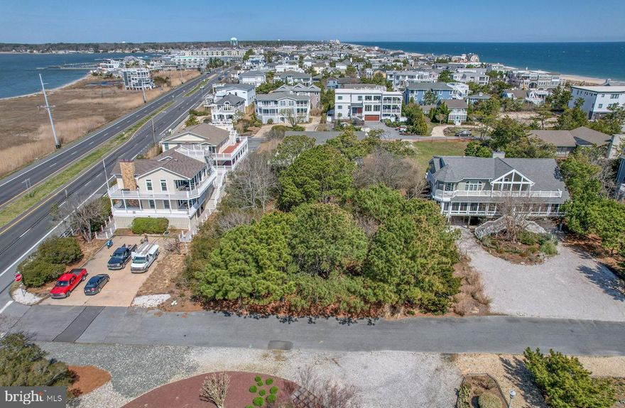Build the home of your dreams just steps from the private beach in Indian Beach! This 100'x100' building lot can accommodate a variety of floor plans and offers the potential for spectacular views of the Rehoboth Bay.  Just minutes away from all the restaurants and nightlife that Dewey Beach has to offer or enjoy a short ride on the Jolly Trolley which connects you to the shops, restaurants, and boardwalk on Rehoboth Avenue.