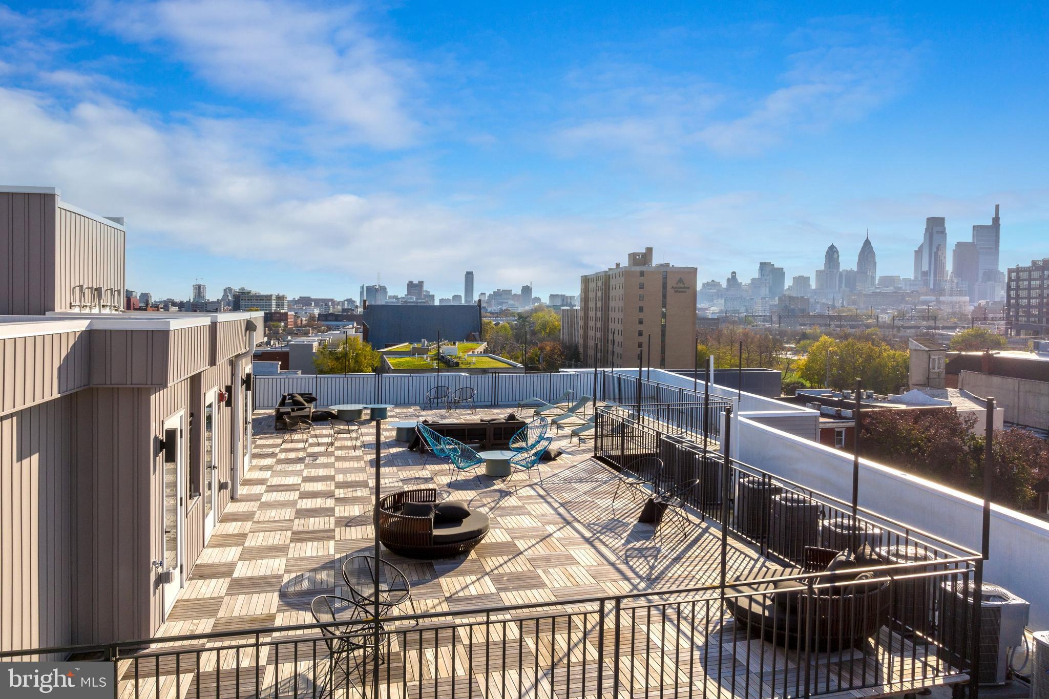 Welcome to The Marquee, a 36-unit apartment community offering modern amenities and city convenience. Residents enjoy keyless entry, a furnished roof deck with skyline views, a shared courtyard with grills, a resident lounge with coffee bar, bike room elevator access, and a secure package room. et-friendly and near public transit, The Marquee is also close to vibrant neighborhoods like Northern Liberties, Fishtown, and Fairmount—putting top restaurants, shops, and cafes right at your doorstep. Each unit features central air, quartz countertops, stainless steel appliances, in-unit washer and dryer, oversized windows for natural light, and custom built-in closet shelving..