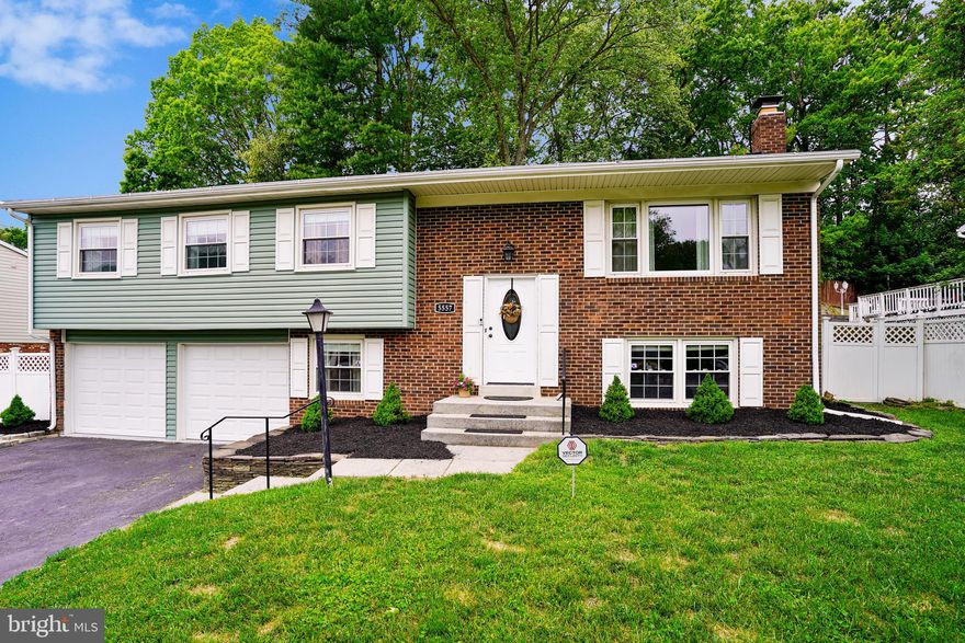 This is the one! Imagine coming home from work pulling into your two-car garage and enjoying a nice evening out on your large freshly stained back deck while you enjoy the sounds of Nature! Perfect timing to host your housewarming over the BBQ.  This home is meticulously maintained. You will appreciate the renovated bright white kitchen with New Cabinets gorgeous upgraded granite counters, SS appliances & New Glass tile Backsplash.! You will love the Gleaming hardwoods on the main level, fresh paint, and the brand new floors in the Master Bedroom.  When you venture downstairs to your Fully finished recreation room you will notice it has a separate bedroom and bathroom, making it an ideal place to host your guests! You will appreciate all the improvements these sellers have made all for you, now all you have to do is Move-in! Close to the Commuter lot, I95,  Grocery,  Shopping, and more!! Don't miss your opportunity, it won't last!