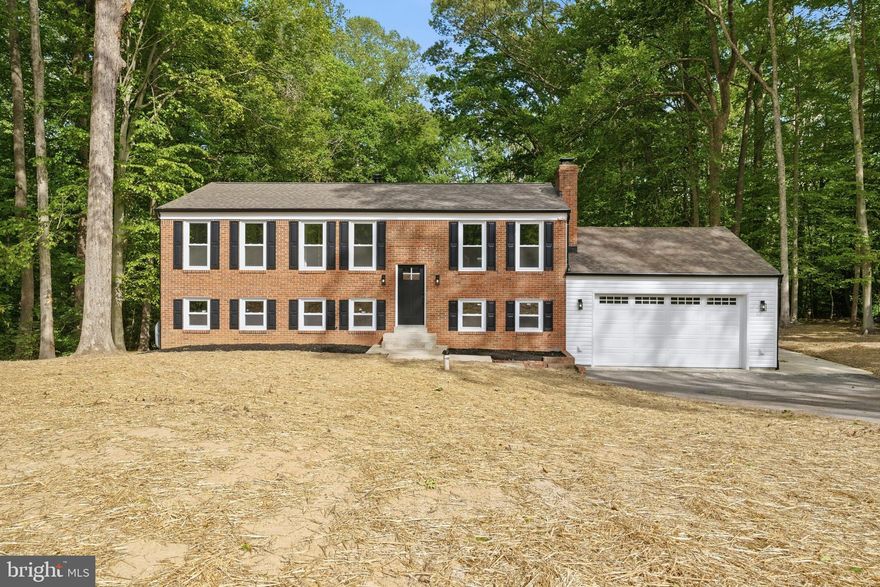 Tremendous Value! Brilliantly Renovated Home on over 2 acres in a Water Privileged Community!  Tucked away on over 2 private acres at the end of a quiet cul-de-sac, this exceptional home offers the perfect blend of serenity, space, and thoughtful design. Boasting over 2,000 square feet of beautifully finished living space, the open floor plan is filled with abundant natural light and enhanced by a harmonious feng shui layout that creates a warm and inviting atmosphere throughout.
The spacious kitchen is a true centerpiece, featuring beautiful quartz countertops, stainless steel appliances, and center island, perfect for entertaining.  Every inch of this home has been carefully curated to provide both comfort and style with high-end upgrades throughout that reflect meticulous craftsmanship and attention to detail.
Additionally, you can have peace of mind know that this amazing home offers  a newer roof, windows, HVAC, and a brand-new deck—perfect for relaxing or entertaining while enjoying the peaceful surroundings.  The oversized garage provides ample storage and functionality.
Call today to view this stunning home!