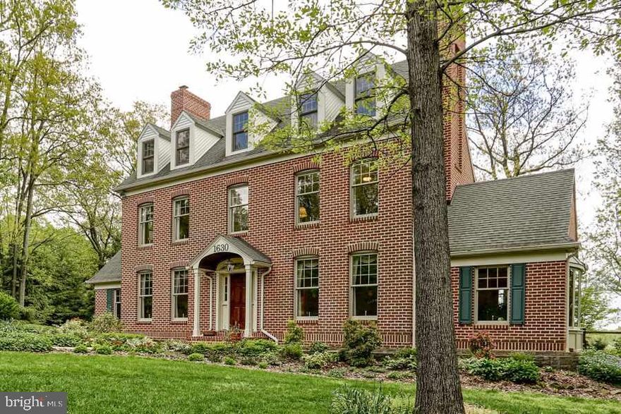 Stately, Grand, and Sophisticated.  This house stands out among the rest. Oversized 3 car garage with stairs to attic and LL, currently a workshop. 4 Beds, 3.5 Baths. Two bow windows. Brick built-ins. Amazing grounds; mature trees and flowers. Fenced-in patio. Skylight. Convection Oven. Lots of storage. Geothermal heating. 2 Fireplaces. Must see for yourself.