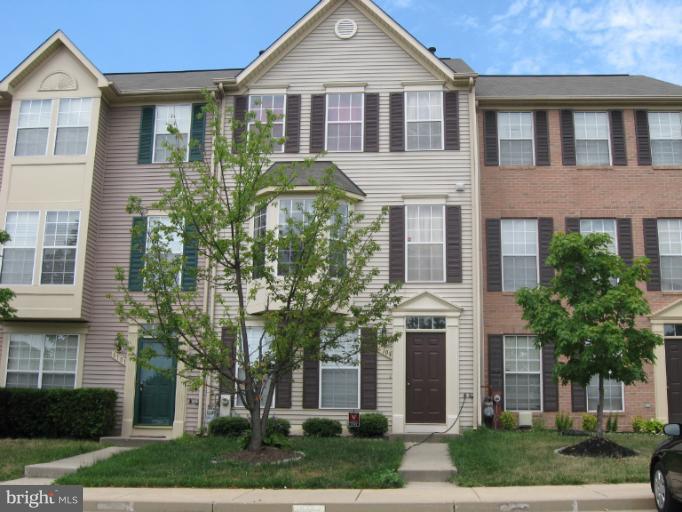 Spacious MOG townhome with updated renovations! Hardwood floors on first and second floors, new carpet on third level, freshly painted throughout, 4 bedrooms, 3.5 baths, all appliances, finished 1st floor w/laundry, eat-in-kitchen, large pantry, warm gas heat, deck w/small sun room, patio, fence, cable ready, alarm system, walk-in-closets, ceiling fans, vaulted ceilings. Convenient to major highwa