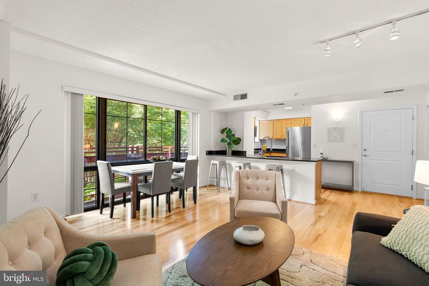 *PRICE ADJUSTMENT*  in close-in Silver Spring - this light-filled two bedroom, two bath condo has been well maintained ( new HVAC!!) and beautifully updated. A corner unit with no unit underneath, you’ll enjoy the peace and quiet. The open concept living and dining area has a wall of windows overlooking the neighborhood and creating a great sense of space. The kitchen features granite countertops and a seating peninsula and has been updated with new stainless steel appliances and a stylish backsplash. The large primary bedroom has a walk-in closet and en-suite bath. The second bedroom could also serve as a great home office. An in-unit washer and dryer means no lugging laundry! Aurora amenities include a fitness center, common room and a lovely courtyard,  and the building is pet-friendly. Walk to Metro, shopping, playgrounds, restaurants, farmers markets, entertainment and more!
MoCo parking garage-Kennett Street Garage (Garage 9)- is just NEXT DOOR.
 Application for a monthly pass can be found by going to https://www.montgomerycountymd.gov/DOT-Parking/Resources/Files/pcs_application_form.pdf


Here’s What You’ll Love About This Home
New engineered wood flooring (2024)
New carpet (2023)
New HVAC (2022)
New water heater (2022)
Kitchen appliances (2020)

Here’s What’s Nearby
0.2 mi to Target
0.3 mi to Jessup Blair Park
0.5 mi. to Giant Food
0.8 mi to Silver Spring Metro
0.8 mi to Downtown Silver Spring
0.9 mi to Whole Foods Market