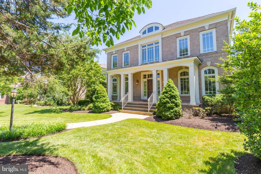 Stunning Gulick home! Over 1/2 ac prem lot facing common & pond! 4,800+ sq ft fin on 3 lvls! Loaded w/ HRDWD flrs mn lvl, HUGE chef's kit w/cherry, granite, pro grade SS appliances w/6 burner/grill cook top!Gorgeous light & bright family rm, MN LVL office! UL features LUX master suite w/ sitting rm & large bath! 3 additional BR's w/ jack & jill & suite! Private brick patio & much more! A must see!