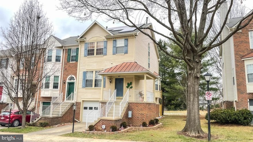 One of the best townhomes on the market! This End-Unit Townhome offers plenty of space for living and entertaining, with hardwood floors throughout the main level, a renovated kitchen and a large deck with stairs. 3 Bedrooms upstairs with 2 fully renovated bathrooms, the owners decided to leave the property furnished for the next tenants. All furniture will stay on the property as advertised in the pictures and 3D Tour (unless you decide you don't need some or all). The basement features an entertainment room with a natural wood burning fireplace and a Powder Room as well as Laundry. The one-car garage has access in the basement and is large enough to hold a car as well as some personal belongings. The home features Solar Panels which will help you save on the Electricity Bill.