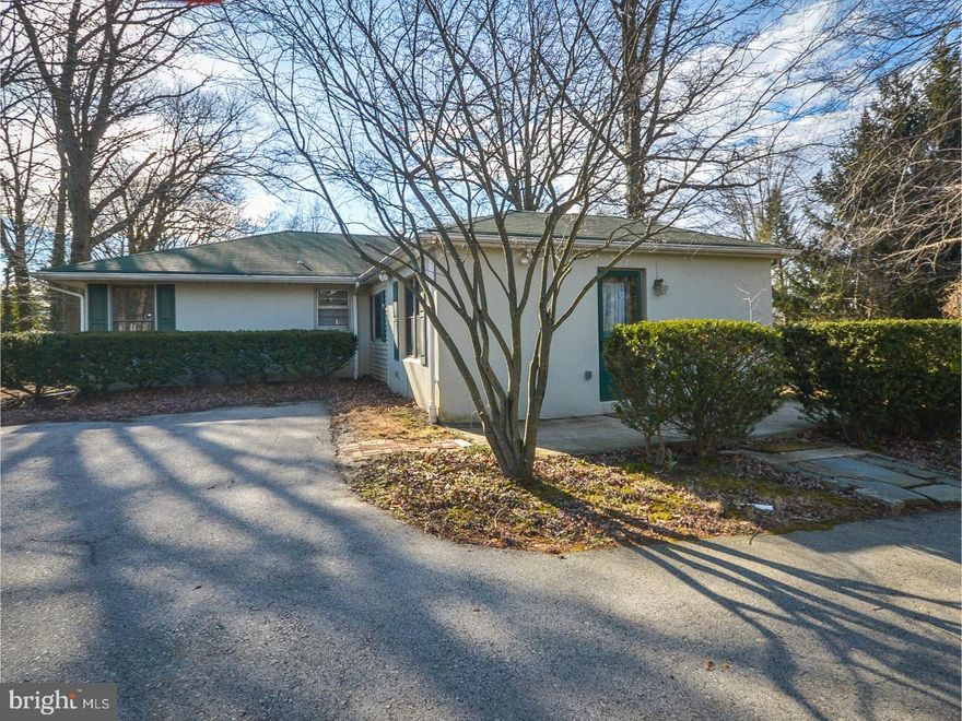 One of a kind ranch house that borders Center Square. There is a bonus room that can be used as a den or office space as desired, and has a separate entrance. Super sized 26' living room with fireplace. Large windows look into the backyard. Expansive garage space with high ceilings. Garage space ideal for contractor for storage and/or workshop.