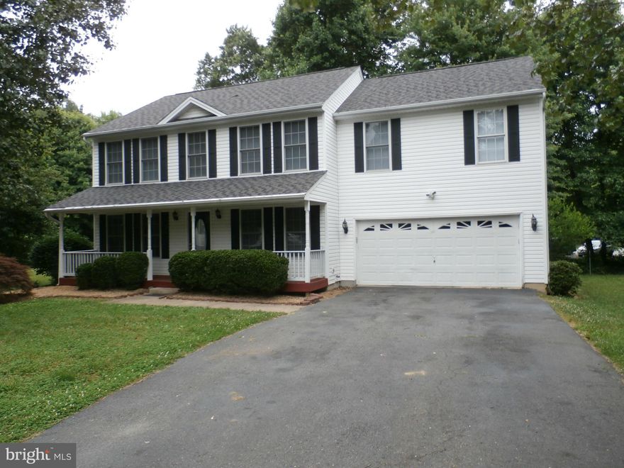 Pool /tennis community.New carpet through out.this large colonial with 4 large bedrooms & 2 1/2 baths. Formal Living & dining room. Stone fireplace in family room.Eat-In kitchen, Huge master suite .Screened in porch with deck and patio over looks large cul de sac yard. 2 car garage. Very clean Move In ready