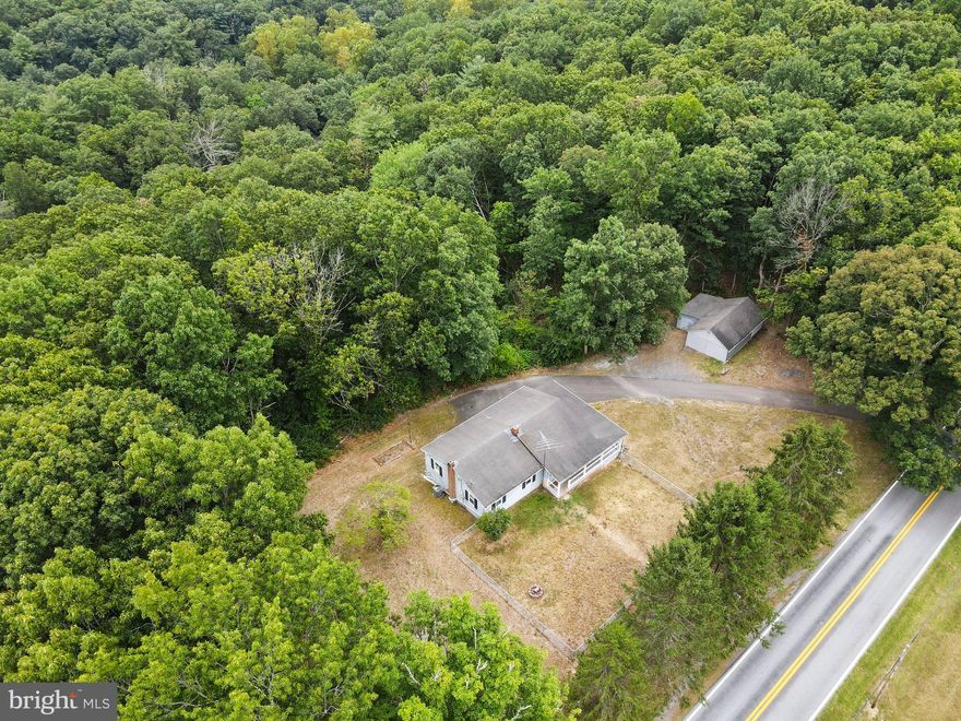 Nestled in the serene landscapes of Hancock, Maryland, 14323 White Oak Ridge is a welcoming 3-bed, 2-bath home with a very functional layout. Inside, a spacious living room with large windows invites natural light, creating a warm and inviting atmosphere. The well-organized kitchen and dining area are perfect for gatherings. The unfinished  basement provides potential for customization for recreational use, or additional living/work space as there is a bathroom, laundry and separate entrance.  Conveniently located a short distance from Hagerstown, Cumberland and WV, with access to schools, parks, and major roads, it's an excellent opportunity to create your ideal home in a friendly community surrounded by nature's beauty. Seller is relocating for work leaving an amazing opportunity for you to make this home yours! Schedule a visit today!