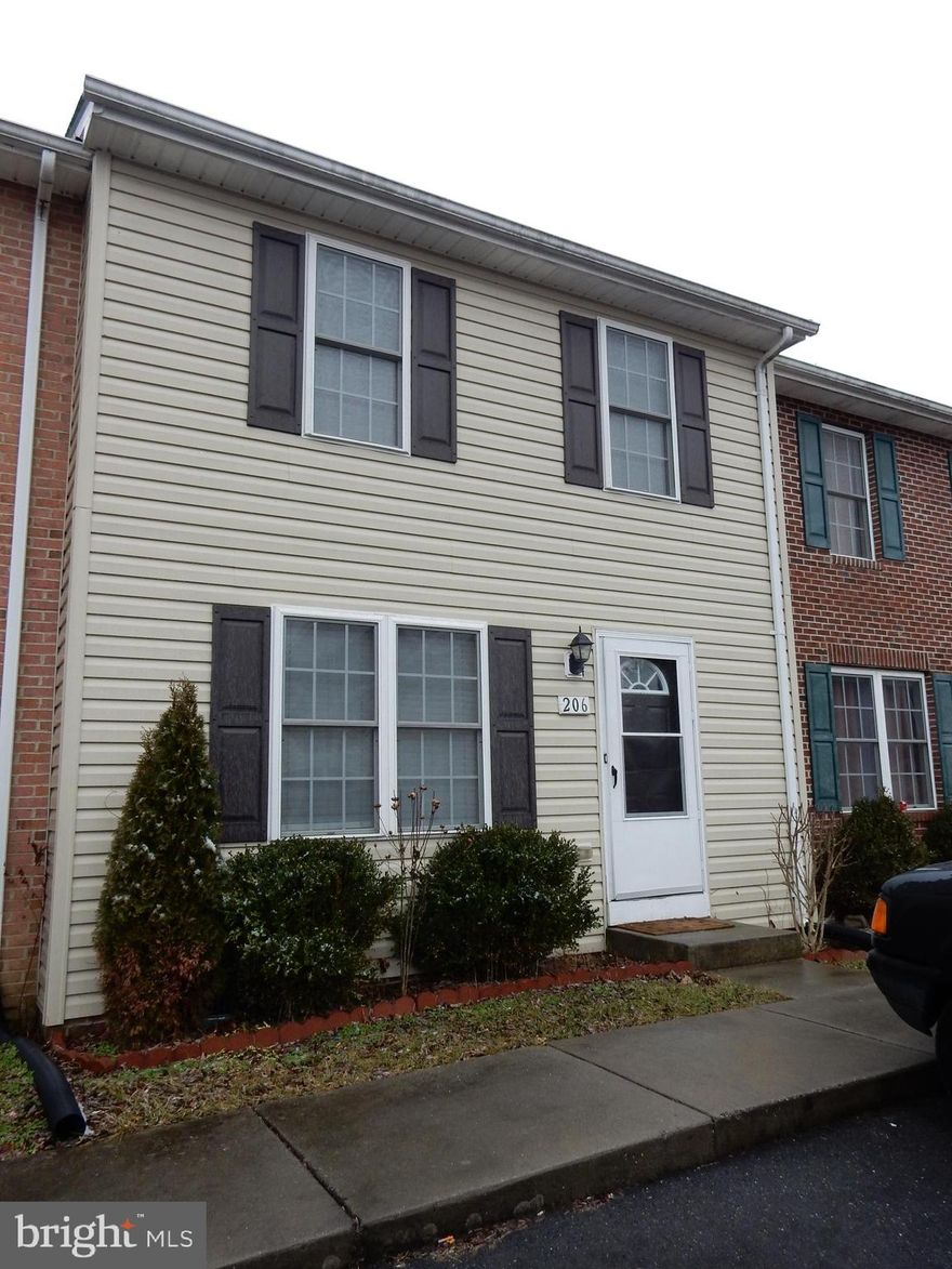 Ready to move in.  Upper level has 2 bedrooms EACH with private full bath, sitting/desk/office area, walk-in closet and ceiling fan.  Main level spacious living room with hardwood floors and ceiling fan.  Large eat-in kitchen with pantry and laundry area with stacked washer/dryer.  Kitchen leads to fenced backyard with shed and deck.  This private yard backs to treed area. Two parking spaces in front of home.  Short walk to Edinburg Town Park for pool, playground, and more.  Conveniently locate only a minute from I-81 Exit 279.   Great home for a first time buyer.  Check with your lender about VHDA loans.